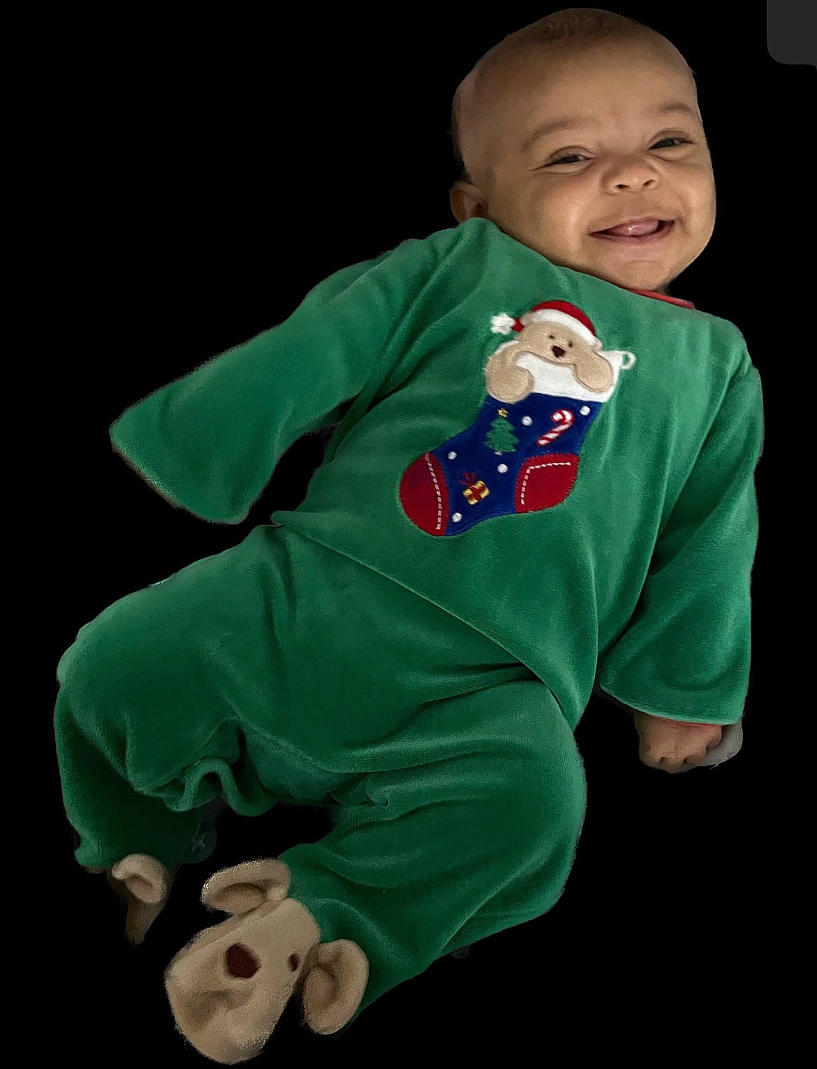 Derrick is registered to the contest to win money with this photo: baby, baby_toddler_clothing, child, christmas, costume, fictional_character, happy, holiday, joy, laugh, person, personal_protective_equipment, sitting, sleeve, smile, stuffed_toy, t_shirt, toddler, top, toy