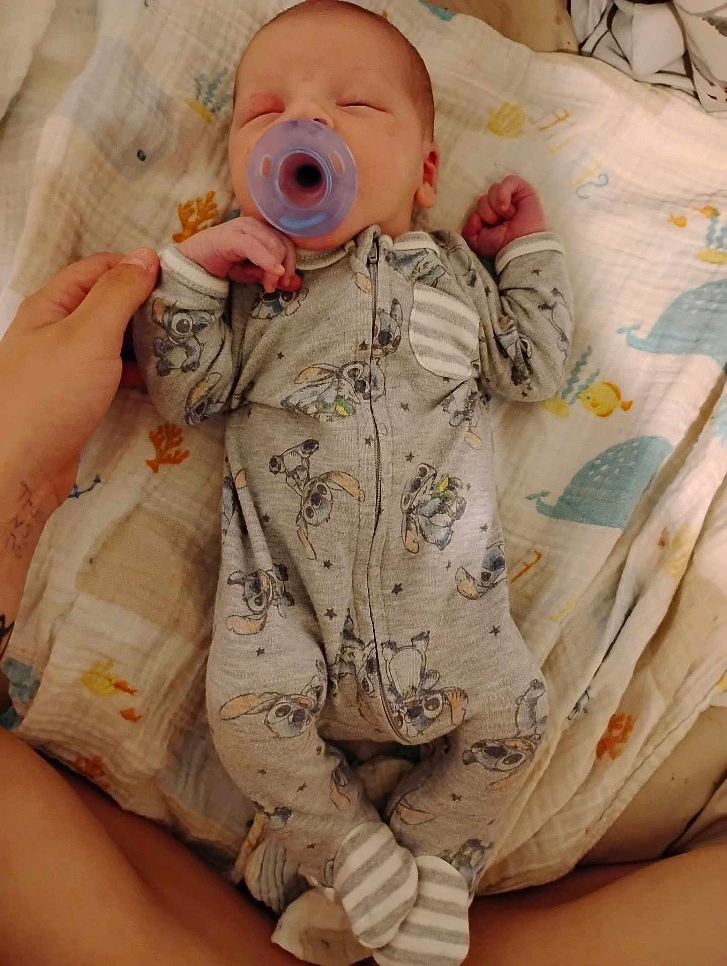Chase joined the competition — help win amazing prizes! baby, sleeping, pacifier, pajamas, cartoon_print, blanket, hand, infant, cozy, cute, bedtime, sleepwear, striped_socks, soft, child, peaceful, resting, newborn, comfort, indoor