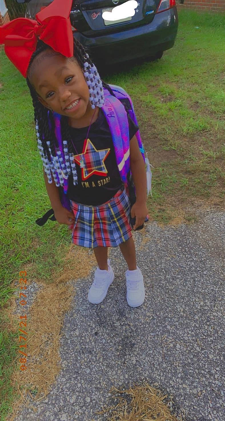 Avamarie is registered to the contest to win money with this photo: baseball_cap, cap, child, cool, electric_blue, facial_expression, grass, happy, head, joy, pattern, person, plaid, shorts, smile, sock, street_fashion, t_shirt, tartan, thigh