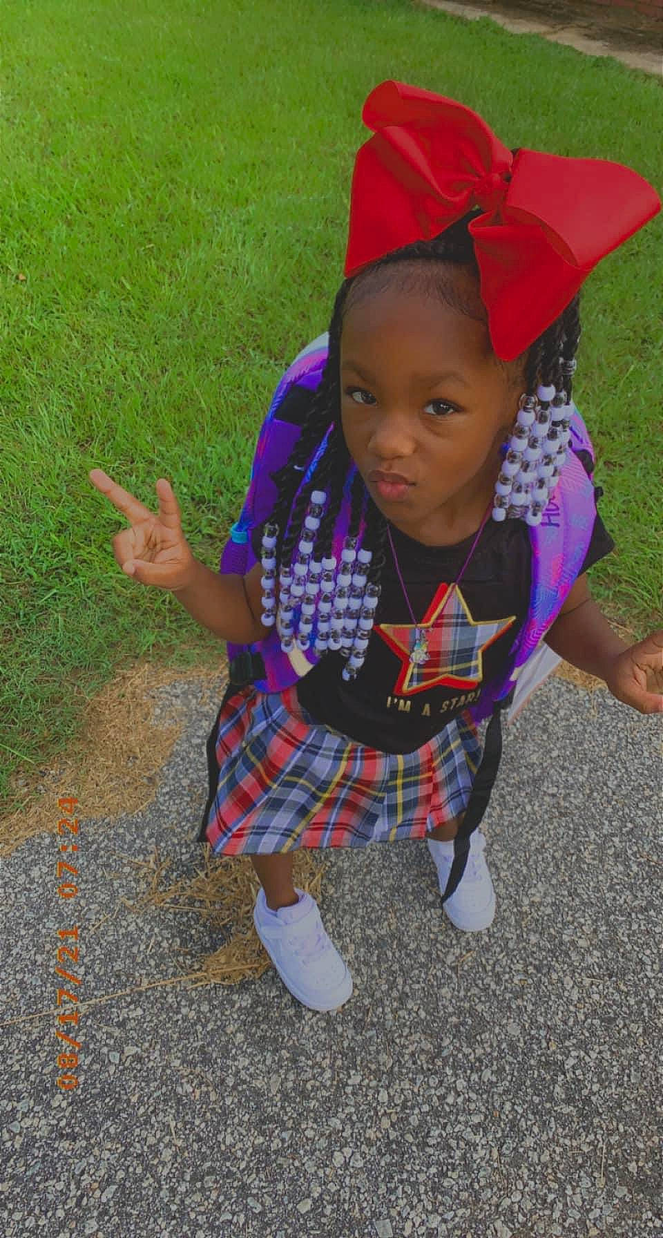 Avamarie is registered to the contest to win money with this photo: baby, baby_toddler_clothing, cap, child, electric_blue, fashion_accessory, fun, grass, happy, magenta, pattern, person, plaid, play, recreation, sitting, sleeve, soil, t_shirt, tartan