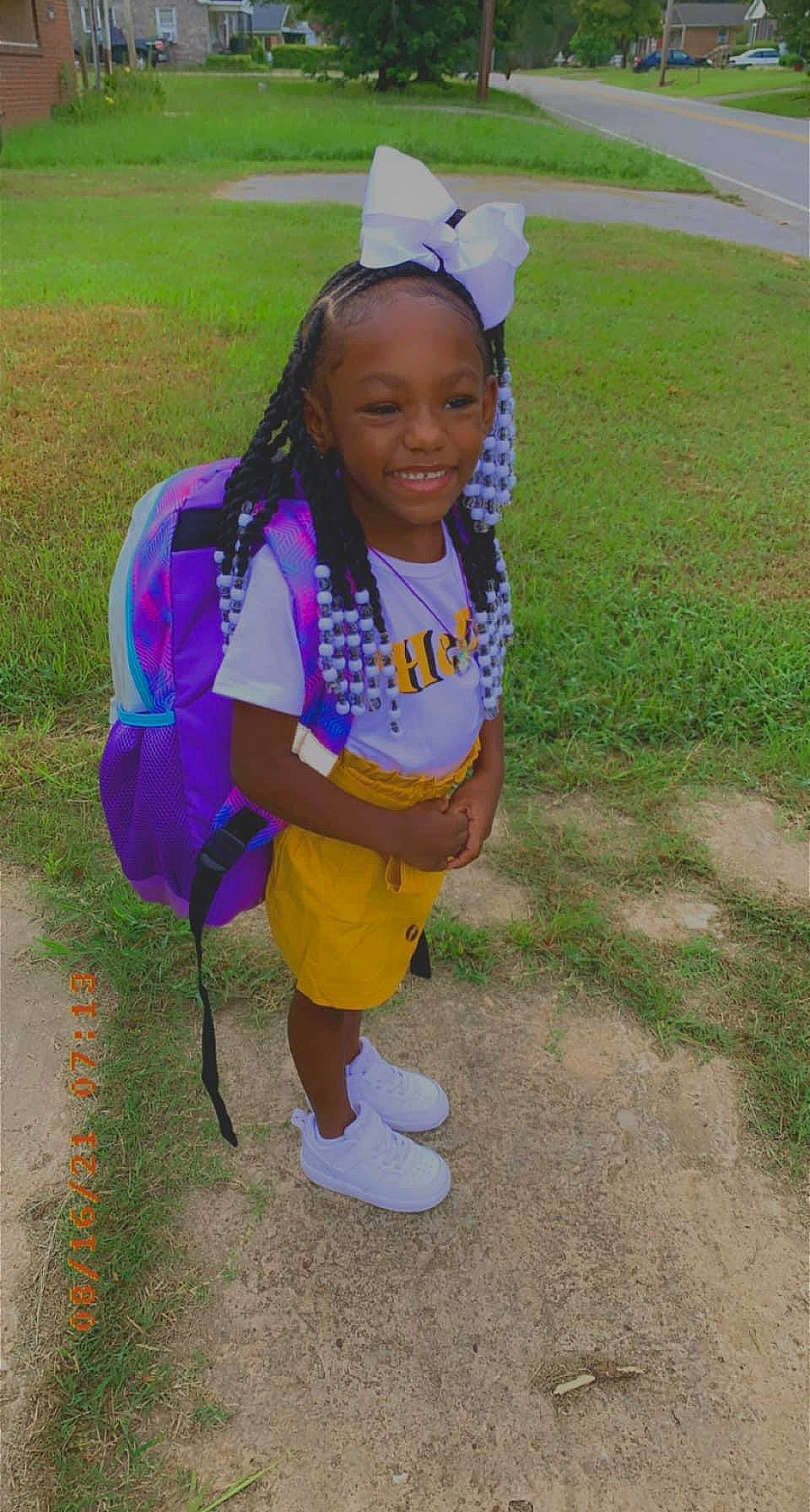 Avamarie joined the competition — help win amazing prizes! child, electric_blue, eye, face, fashion_accessory, fun, grass, grassland, hair, happy, head, joy, leisure, person, personal_protective_equipment, play, recreation, sleeve, smile, t_shirt