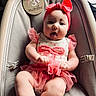 Briley joined the competition — help win amazing prizes! baby, infant, child, pink_headband, pink_tutu, cushioned_seat, wooden_sign, 3_months, tongue_out, cute, chubby_cheeks, indoors, soft_lighting, fabric, person, portrait, smiling, baby_clothes, headwear, sitting
