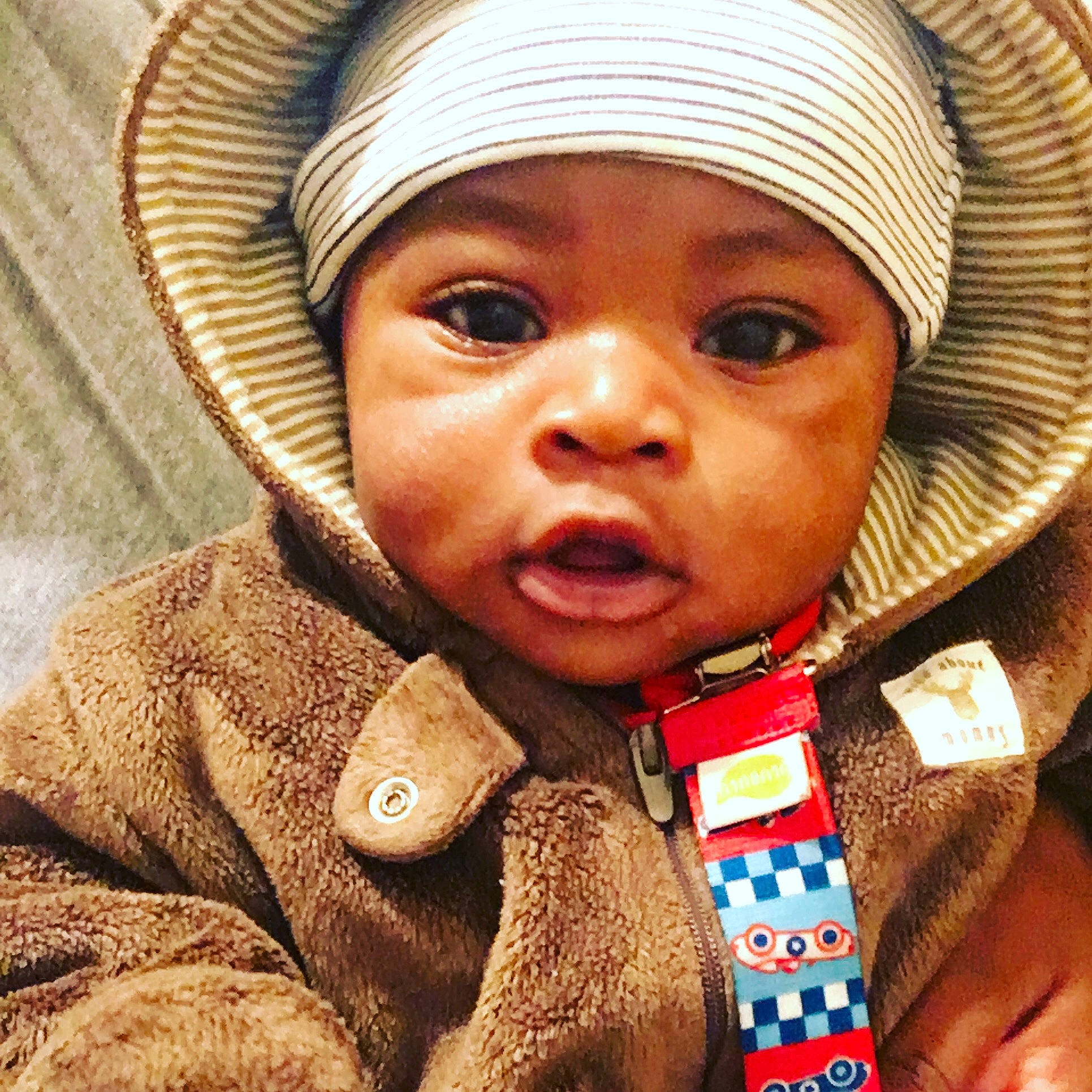 Treden is registered to the contest to win money with this photo: baby, cheek, child, eye, face, happy, head, headgear, headwear, human, lip, mouth, nose, people, person, photography, smile, toddler