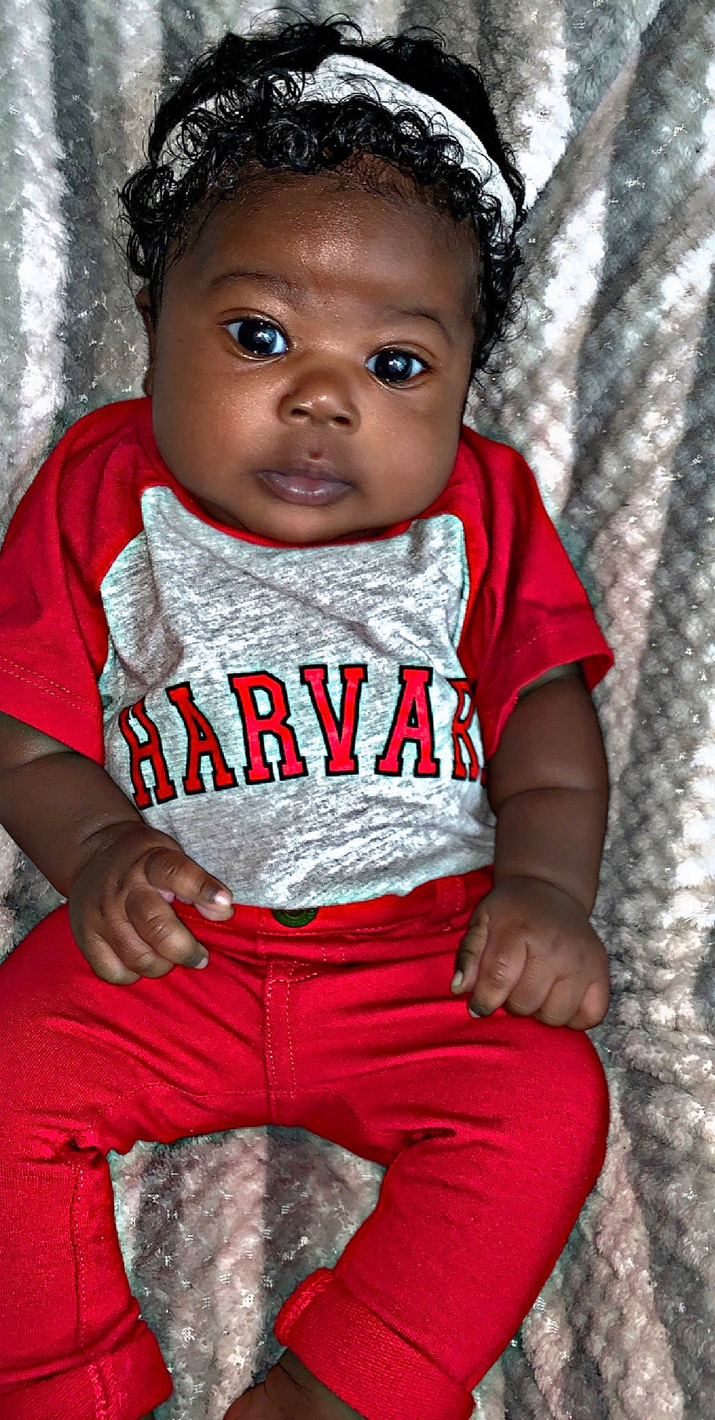 Khaila joined the competition — help win amazing prizes! baby, baby_toddler_clothing, cheek, child, child_model, cool, eye, face, lip, person, red, sitting, skin, smile, toddler