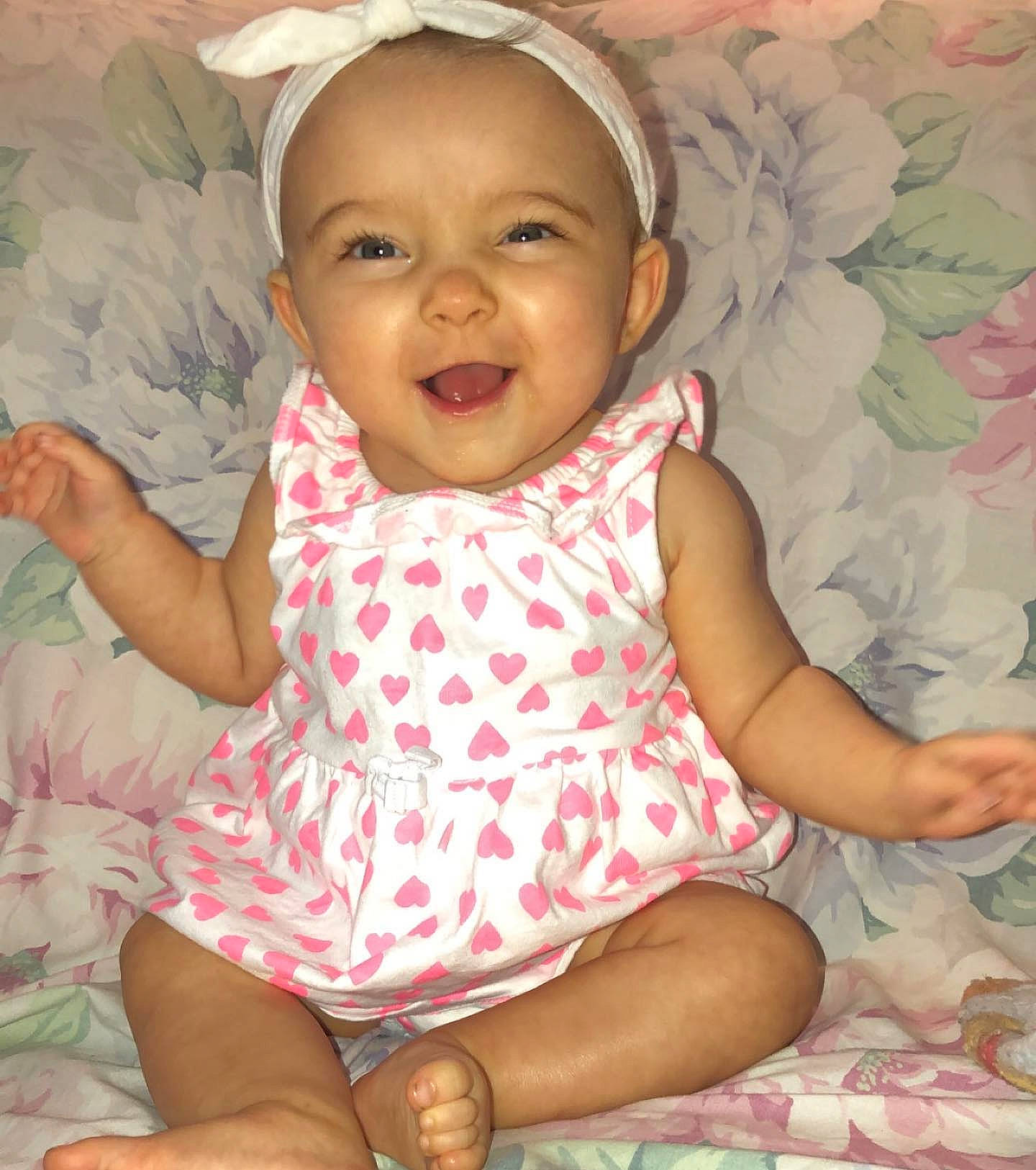 Kenlee joined the competition — help win amazing prizes! baby, baby_laughing, baby_products, baby_toddler_clothing, cheek, child, face, facial_expression, happy, head, lip, person, pink, product, sitting, skin, smile, toddler