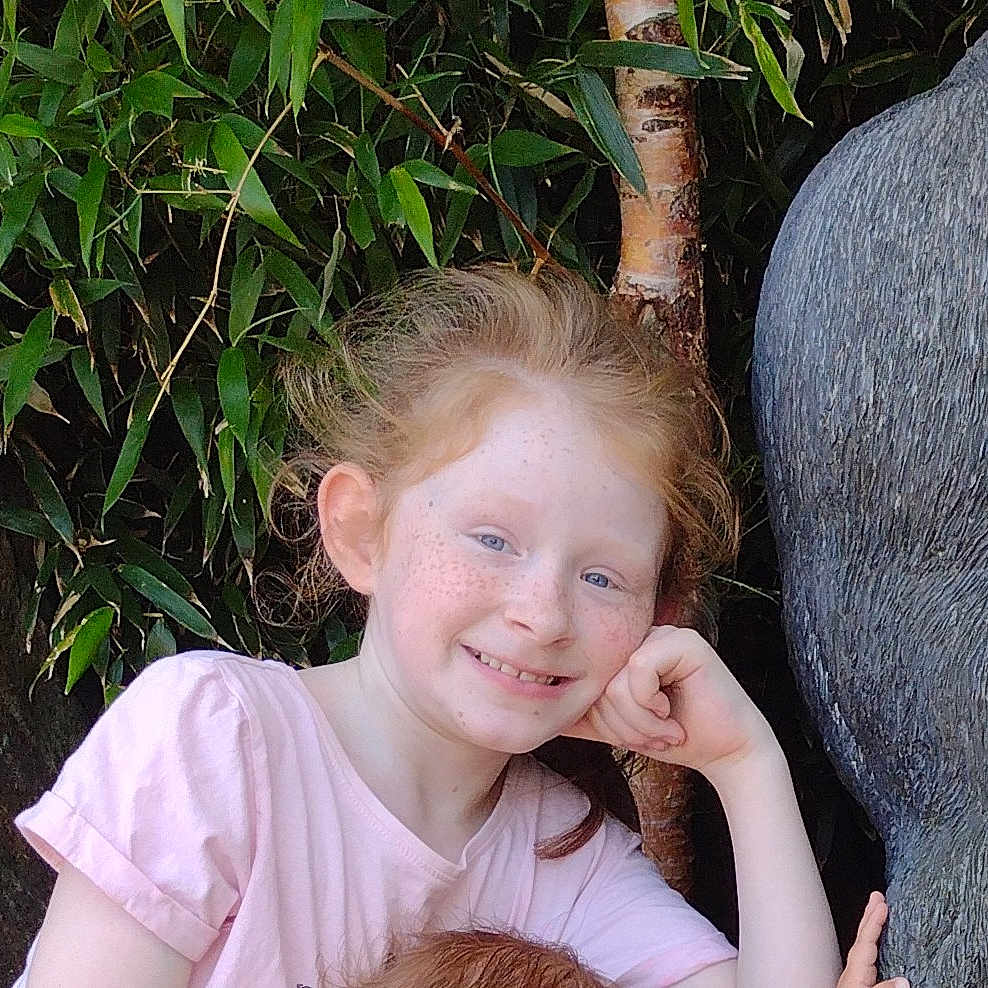 Lainey-Jo joined the competition — help win amazing prizes! animal, blonde, child, clothing, face, female, girl, hair, happy, head, person, photography, plant, portrait, pottedplant, smile, t_shirt, tree, vegetation, zoo