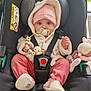 Ely participe au concours pour gagner de l'argent avec cette photo : baby, car_seat, pacifier, plush_toy, pink_hat, white_jacket, pink_pants, baby_shoes, infant, child, seat_belt, indoors, window, toy, cute, bundle_up, sitting, face, blue_eyes, cozy