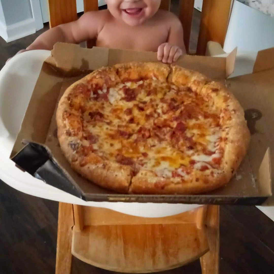 Knighlee is registered to the contest to win money with this photo: architecture, baby, chair, crib, cutlery, diningtable, dish, face, food, fork, furniture, head, infantbed, meal, person, photography, pizza, portrait, sitting, table