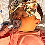 Easton is registered to the contest to win money with this photo: baby, sleeping, pacifier, headband, floral, pink_clothing, infant, closeup, face, hand, blanket, cute, child, soft_light, indoors, newborn, peaceful, resting, portrait, cozy