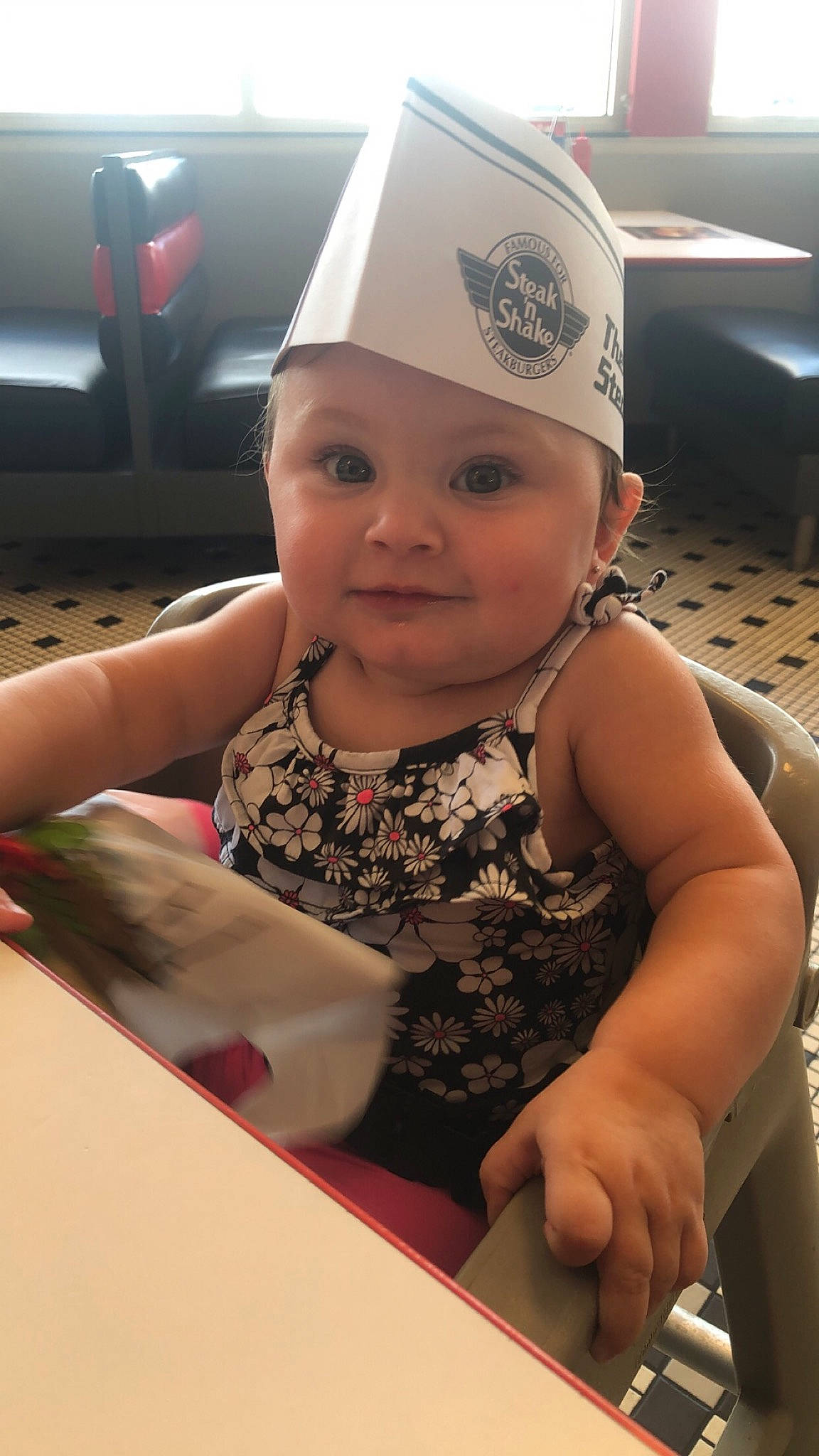 Andi is registered to the contest to win money with this photo: baby, cap, child, fun, hat, head, headgear, headwear, person, smile, toddler, vacation