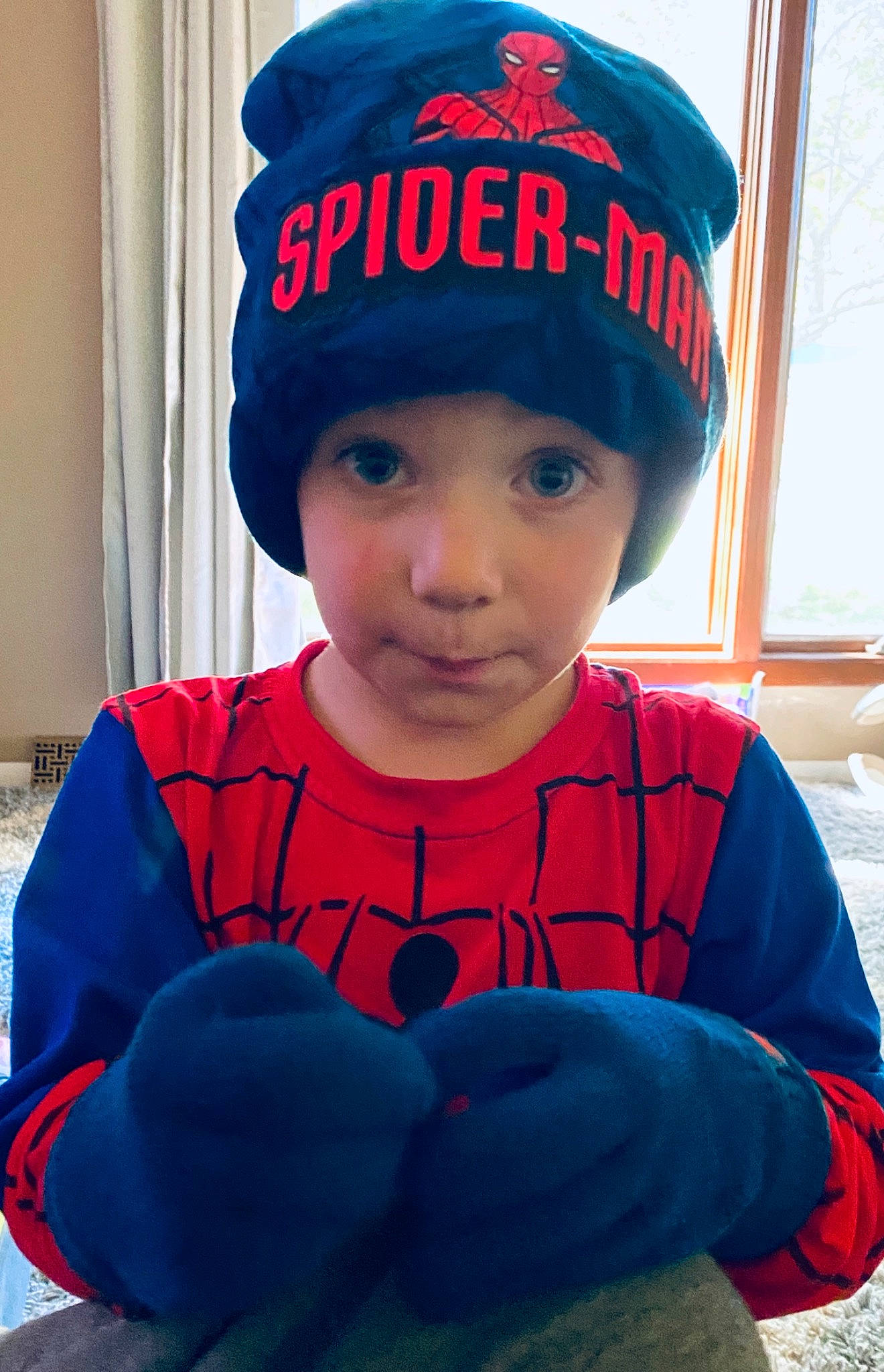 Kacen is registered to the contest to win money with this photo: baby_toddler_clothing, blue, cap, chin, cool, costume_hat, electric_blue, eye, face, fashion_accessory, fun, happy, headgear, human_body, knit_cap, lip, person, red, sleeve, t_shirt
