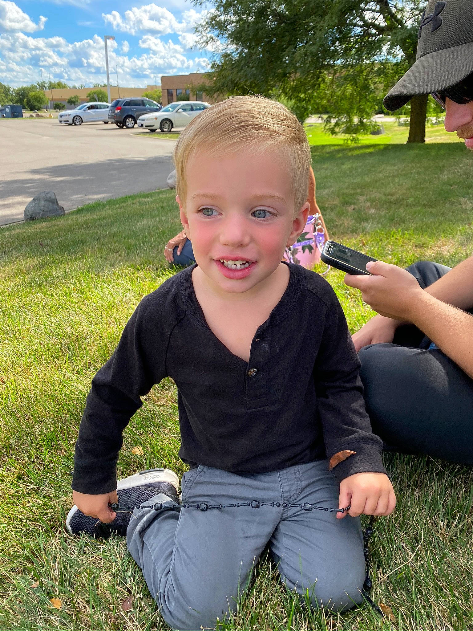 Kacen joined the competition — help win amazing prizes! baby_toddler_clothing, baseball_cap, blue, botany, cap, cloud, grass, hair, happy, hat, head, joy, meadow, people_in_nature, person, plant, skin, sky, smile, sun_hat