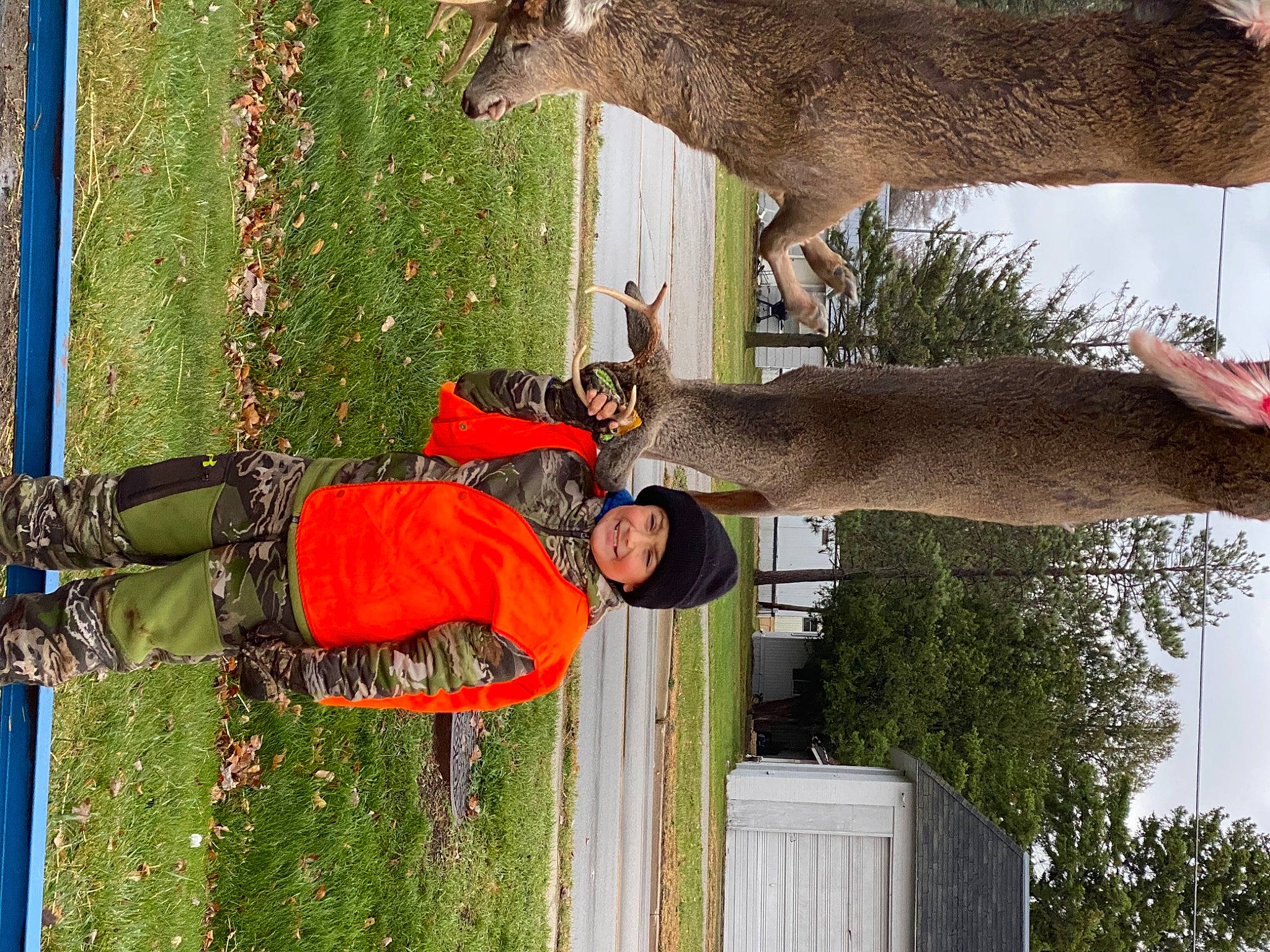 James joined the competition — help win amazing prizes! deer, dog_breed, fawn, fun, fur, grass, green, headwear, joy, leisure, mammal, person, photograph, photography, plant, recreation, smile, snapshot, terrestrial_animal, tree