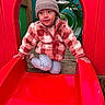 child, slide, playground, red, jacket, hat, tunnel, wood, outdoor, play, curious, clothing, person, fun, casual, winter, park, active, smiling, kneeling