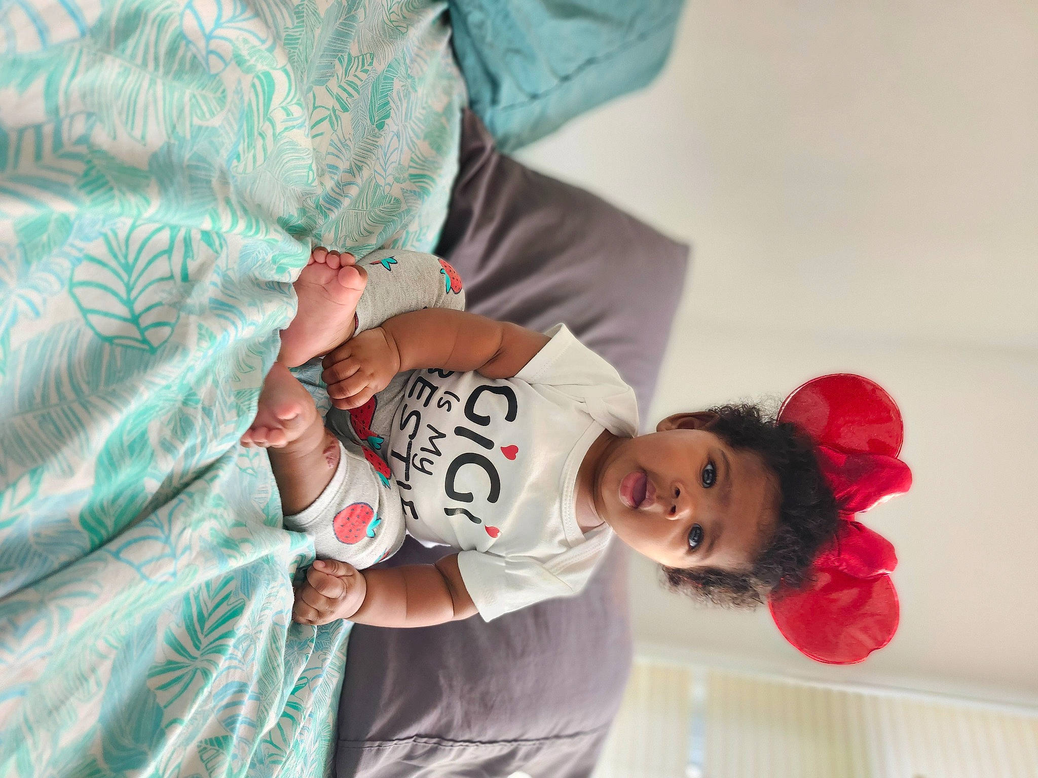 Janelle joined the competition — help win amazing prizes! baby, baby_toddler_clothing, child, comfort, elbow, event, happy, linens, pattern, person, room, skin, sleeve, toddler