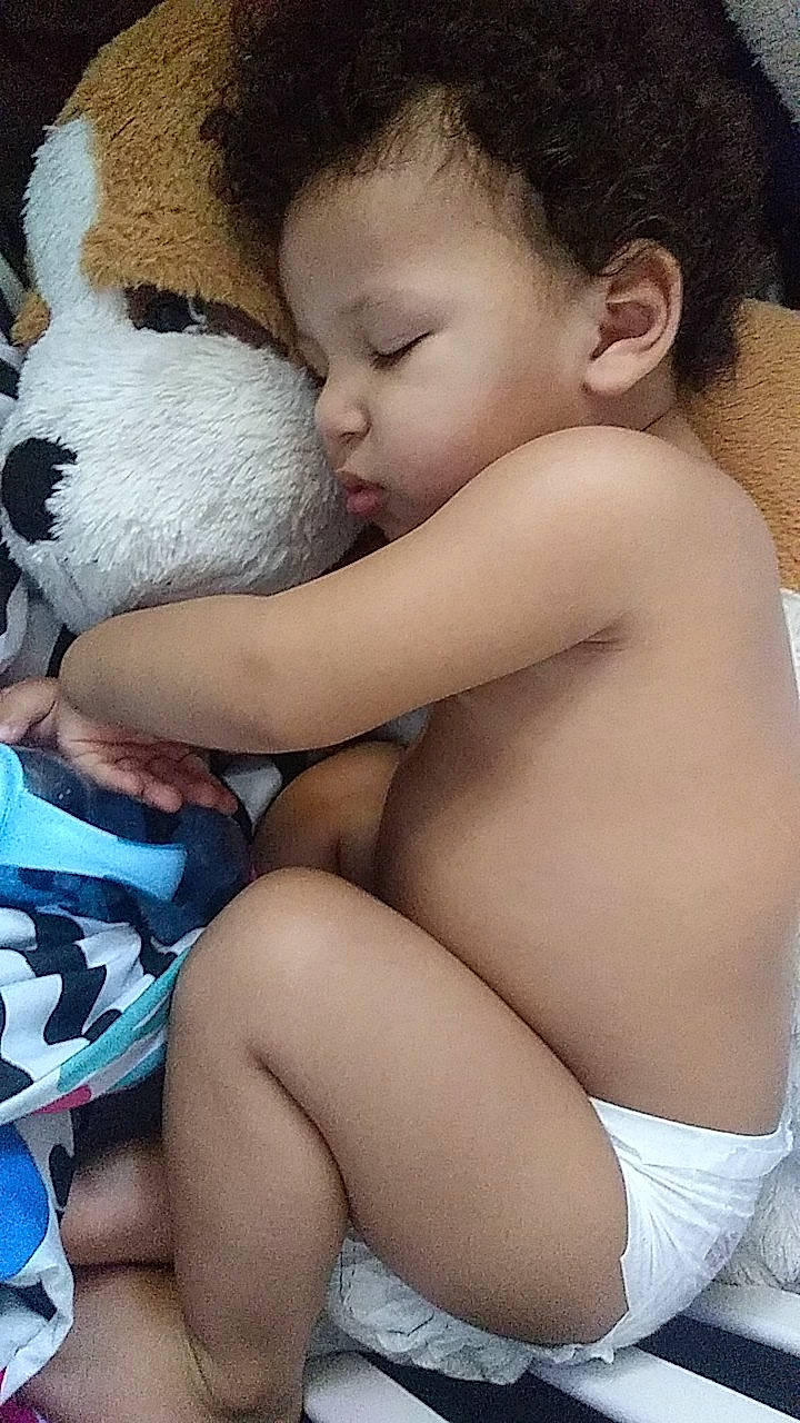 Lamont joined the competition — help win amazing prizes! baby, black_hair, cheek, child, hug, interaction, leg, nap, person, sleep, thigh, toddler