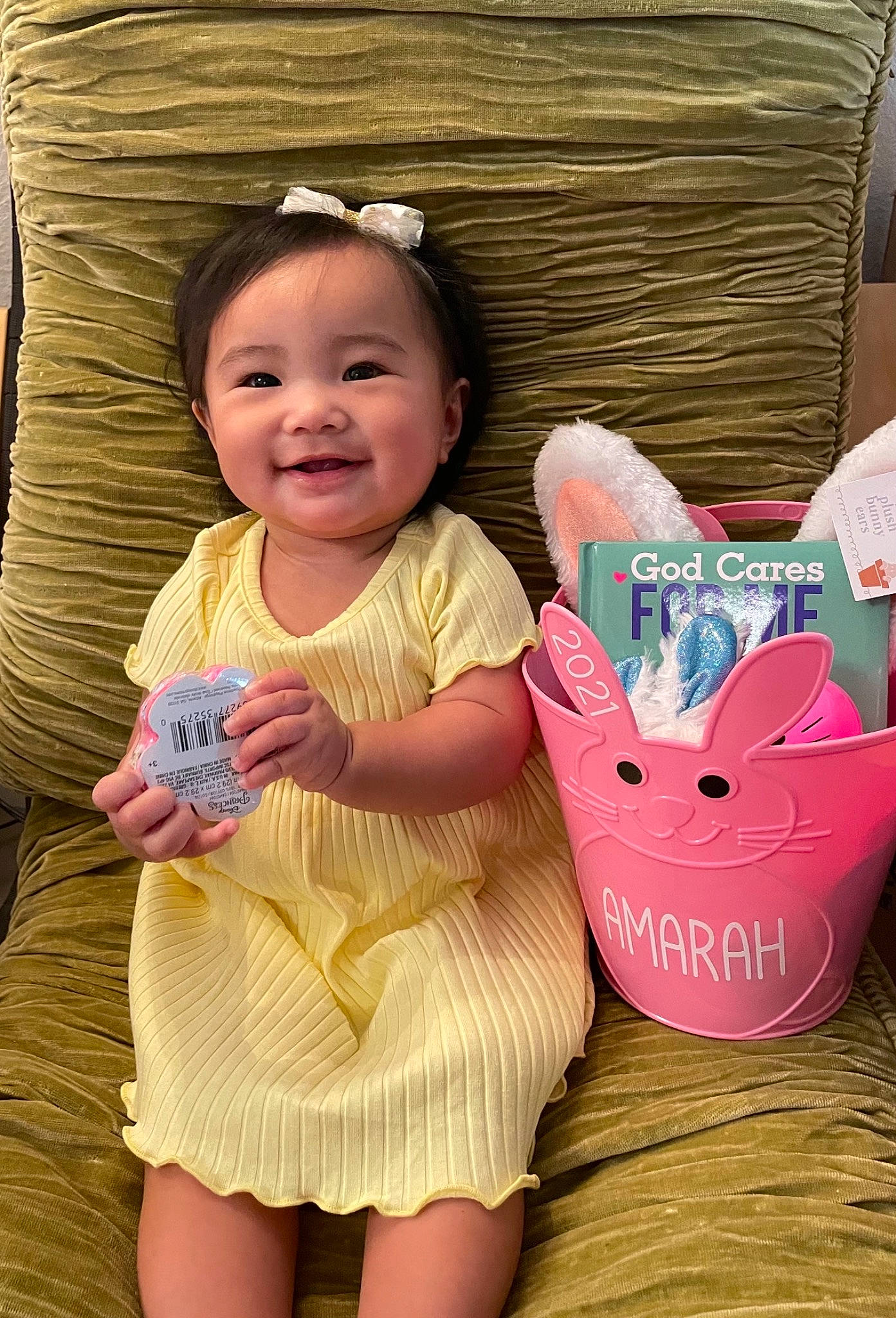 Amarah is registered to the contest to win money with this photo: baby, baby_toddler_clothing, cheek, child, facial_expression, fashion_accessory, fun, happy, head, human_leg, joy, person, pink, product, sitting, skin, sleeve, smile, textile, thigh