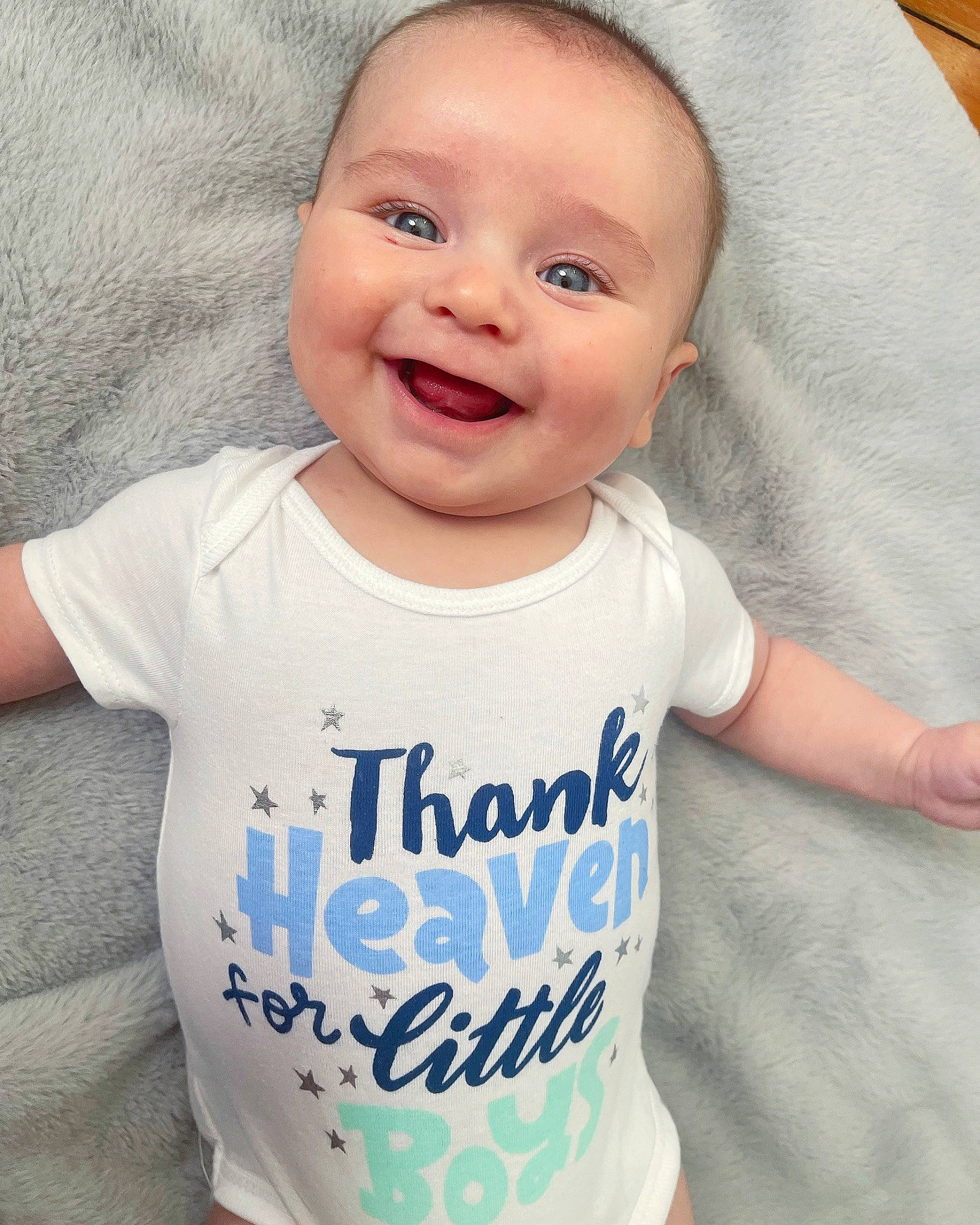 Levi joined the competition — help win amazing prizes! baby_toddler_clothing, cheek, eye, face, facial_expression, gesture, happy, head, joy, mammal, mouth, neck, organ, person, product, skin, sleeve, smile, standing, t_shirt