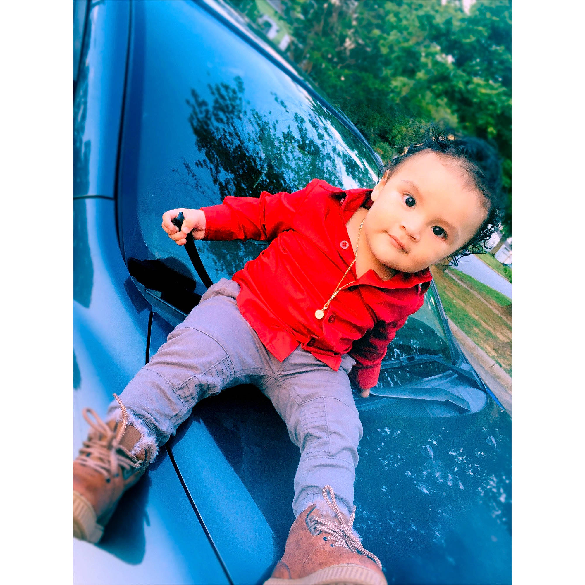 Gael is registered to the contest to win money with this photo: baby, blue, child, child_model, electric_blue, jacket, jeans, leisure, outdoor_play_equipment, outerwear, person, personal_protective_equipment, play, playground, recreation, sleeve, t_shirt, toddler, turquoise, vehicle_door
