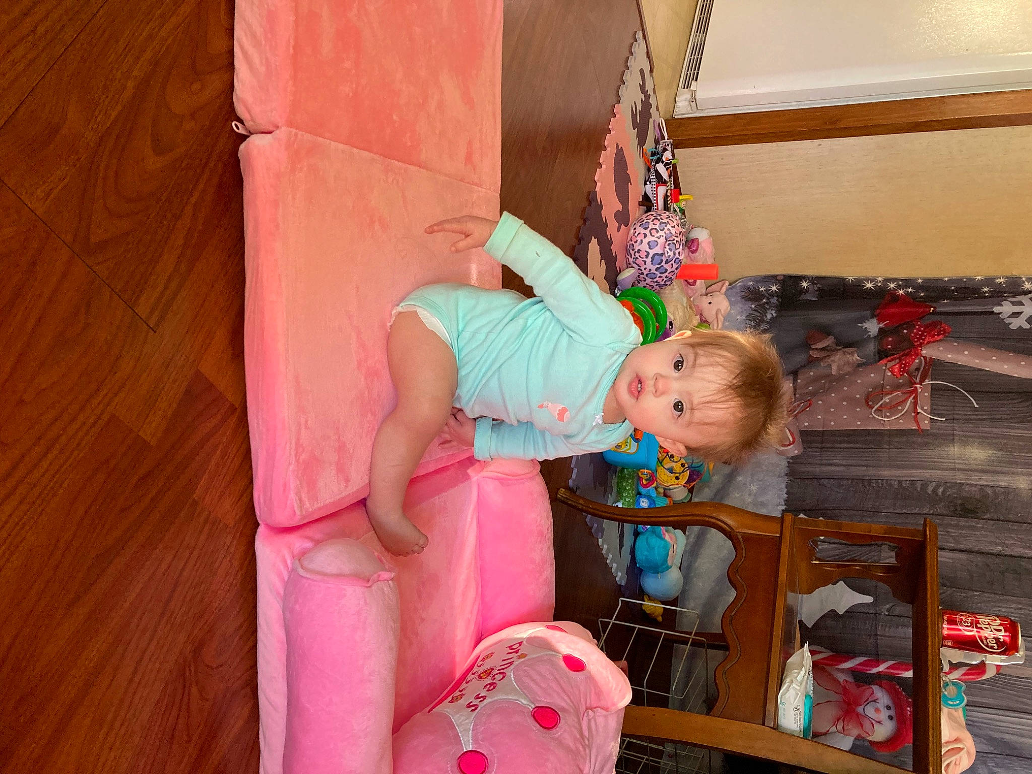 Journi is registered to the contest to win money with this photo: baby, baby_products, baby_toddler_clothing, child, comfort, cradle, drawer, flooring, fun, hardwood, infant_bed, linens, magenta, party, peach, person, pink, play, room, toddler