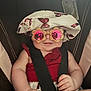 baby, child, sunglasses, hat, car_seat, seatbelt, smile, cute, infant, clothing, accessory, reflection, pink, red, white, flower_shaped, butterfly, safe, indoor, portrait