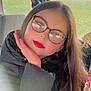 Ennélya a rejoint le concours — aidez-le/la à gagner de superbes lots ! child, girl, glasses, car_interior, jacket, long_hair, red_lipstick, earrings, window, green_field, portrait, hand_on_face, casual, seated, young_person, natural_light, fashion, reflection, expression, indoor
