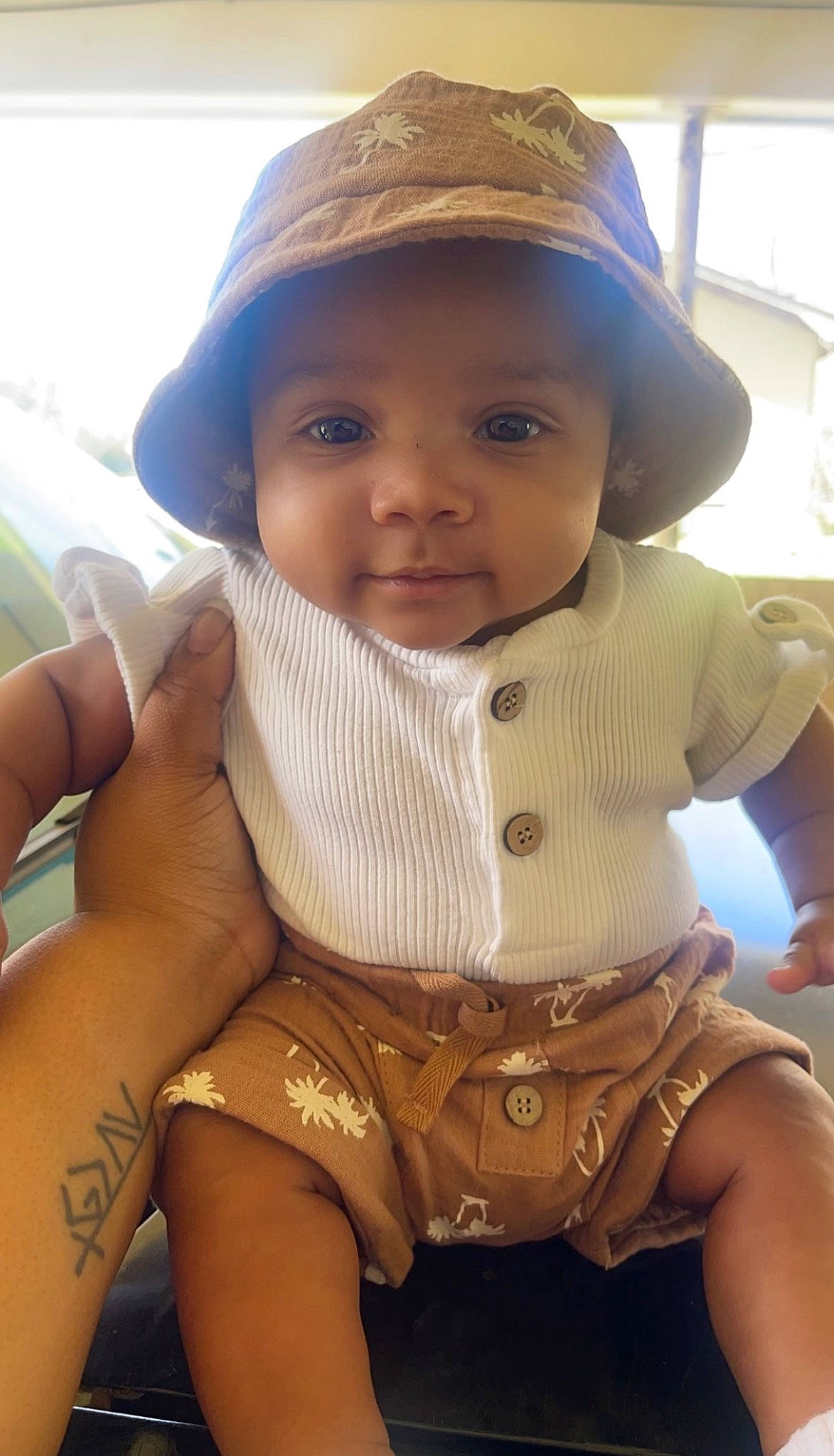 Crue joined the competition — help win amazing prizes! baby_toddler_clothing, cap, cheek, child, chin, cool, grass, happy, hat, headwear, human, iris, lip, nose, outerwear, person, skin, sleeve, smile, toddler
