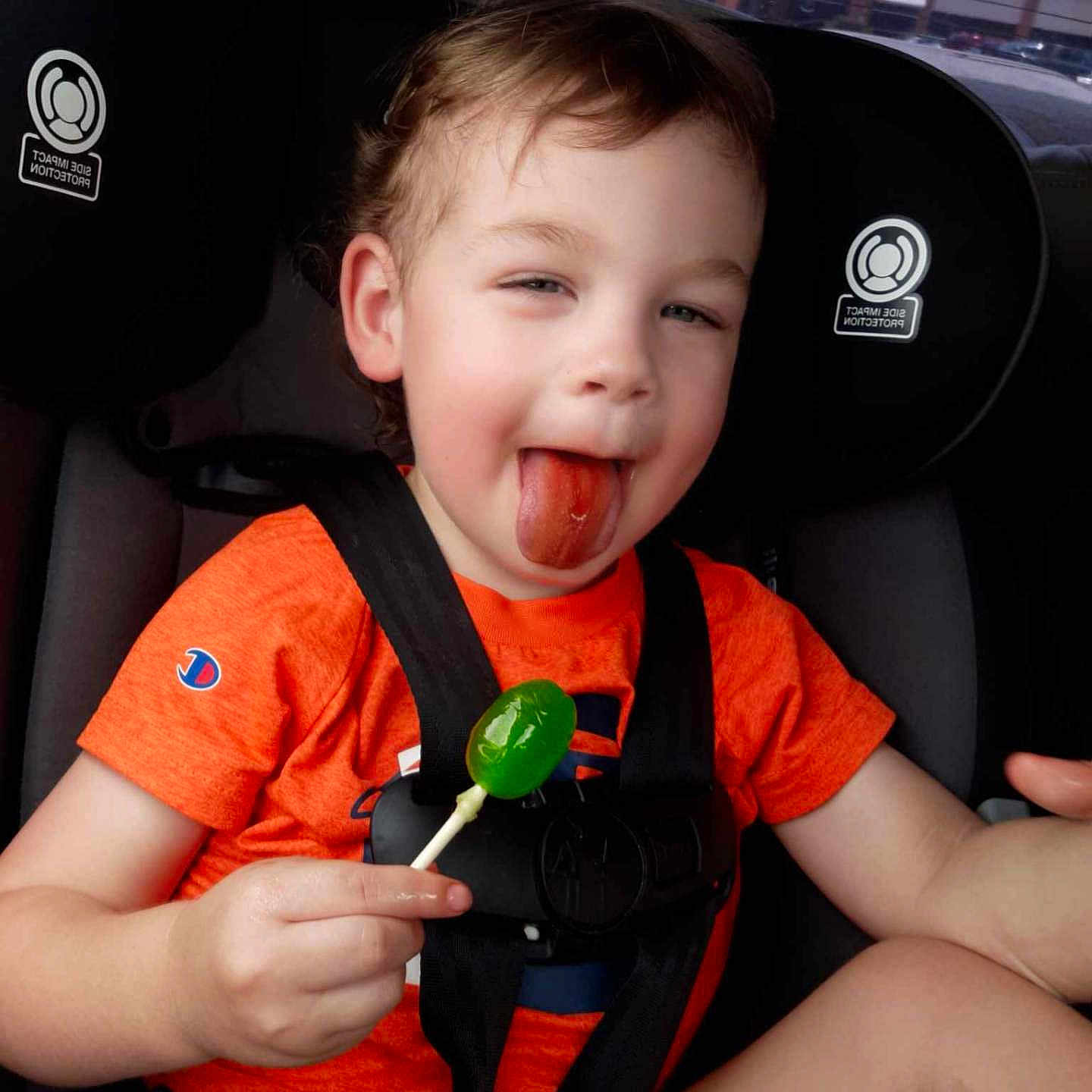 Noah is registered to the contest to win money with this photo: baby, candy, car, clothing, cream, dessert, eating, face, food, head, icecream, lollipop, person, photography, portrait, summer, sweets, t_shirt, transportation, vehicle