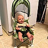 John joined the competition — help win amazing prizes! appliance, baby, cabinet, canopy, child, cute, domestic, floor, floor_tiles, footwear_free, green_chair, happy, indoor, infant, kitchen, person, seat, seat_belt, short_sleeve, smiling
