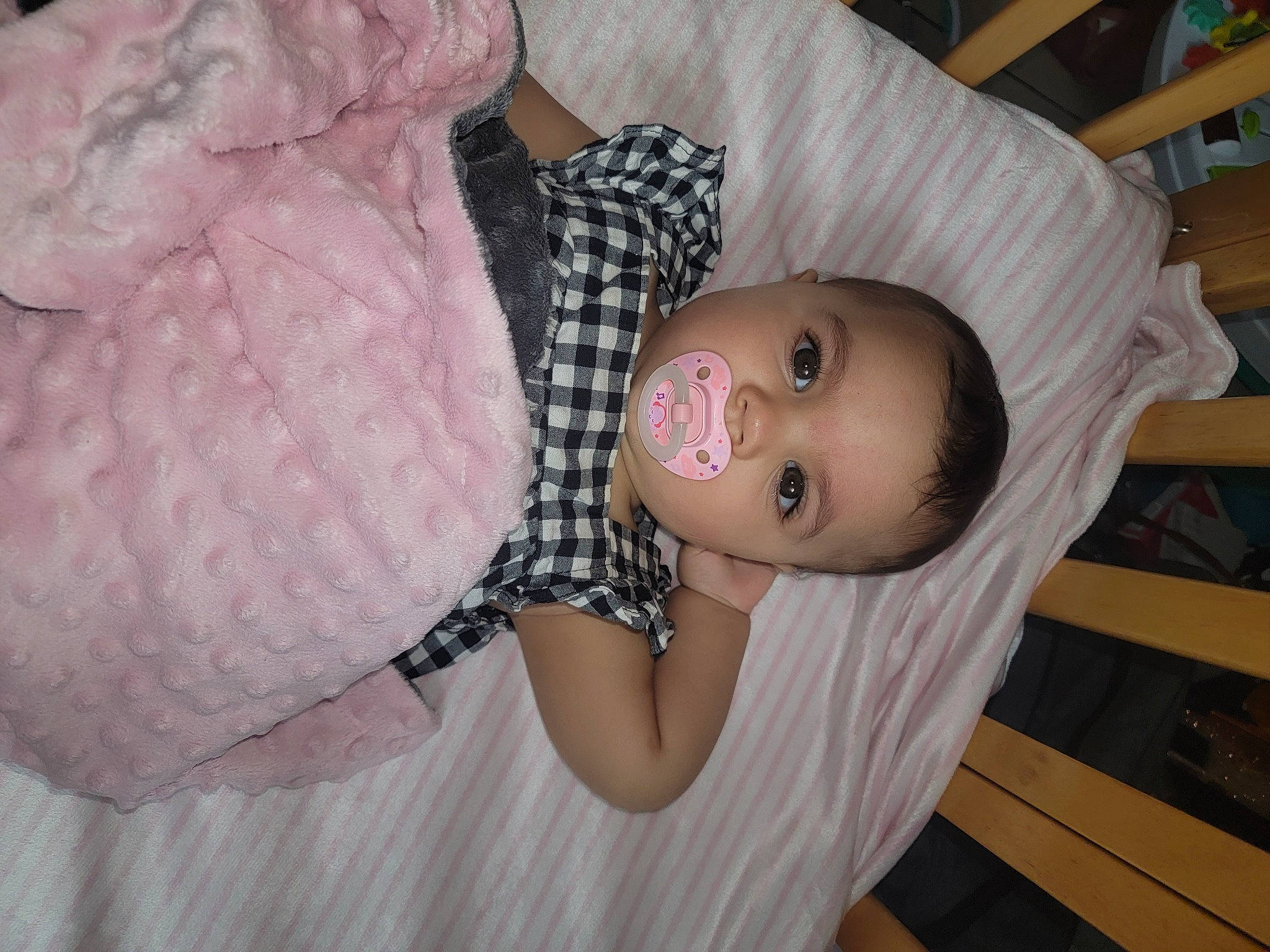 Davina is registered to the contest to win money with this photo: baby, baby_safety, baby_toddler_clothing, cheek, child, comfort, eye, face, flooring, head, human_body, iris, mammal, nose, pattern, person, skin, sleeve, smile, toddler