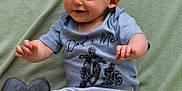 Vincent joined the competition — help win amazing prizes! baby, child, cap, smiling, sitting, shirt, clothing, blanket, happy, infant, foot, hand, cute, portrait, indoors, playful, expression, headwear, soft, comfort