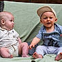 Vincent joined the competition — help win amazing prizes! baby, infant, child, sitting, couch, blanket, cap, clothing, outdoor, wooden_fence, person, portrait, cute, expression, two_people, baby_boy, shorts, shirt, foot, hand