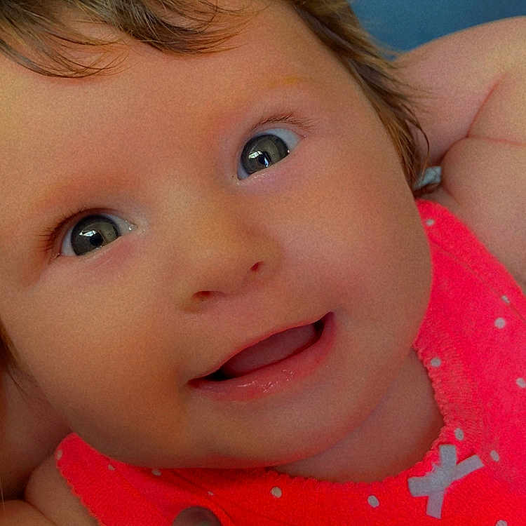 Staylee is registered to the contest to win money with this photo: baby, cheerful, child, close_up, cute, expression, eyes, face, hair, happy, indoors, infant, pacifier, pink_clothing, polka_dot, portrait, skin, smiling, toddler, young_child