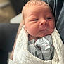 Hudson Bear is registered to the contest to win money with this photo: newborn, baby, blanket, swaddle, infant, person, face, sleepy, resting, soft, closeup, human, cocoon, comfort, tiny, cute, portrait, warm, indoor, newborn_clothing