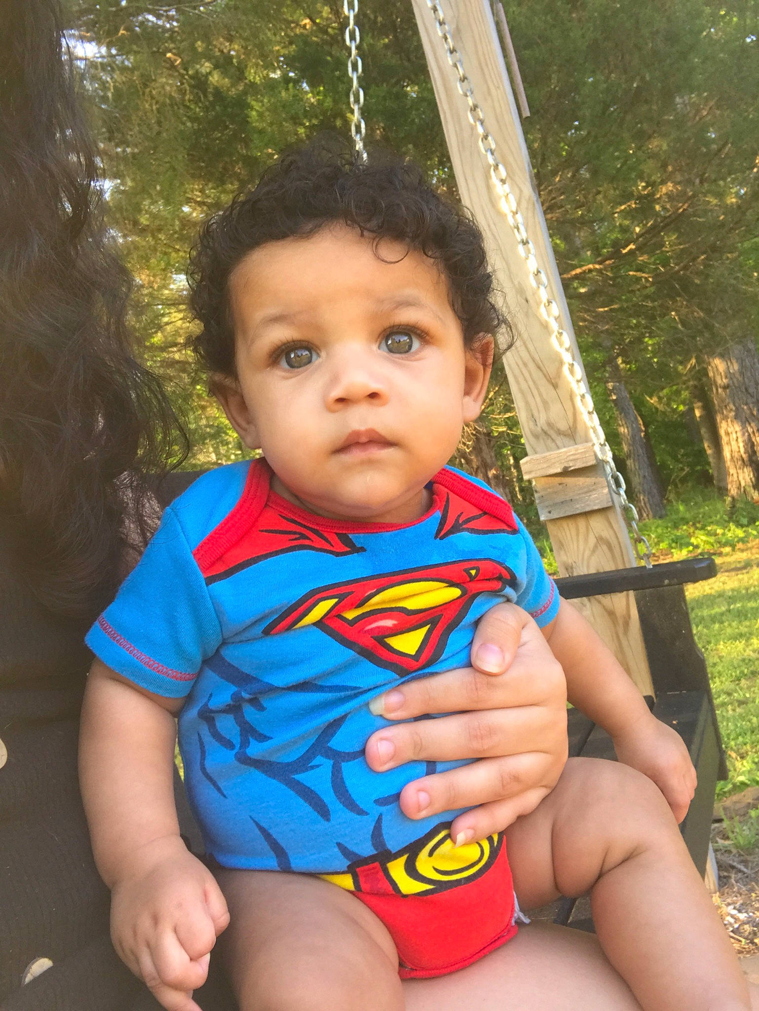 Devin is registered to the contest to win money with this photo: arm, baby_toddler_clothing, child, chin, electric_blue, finger, fun, grass, hand, happy, human_body, leisure, nose, people_in_nature, person, plant, recreation, shoulder, skin, toddler