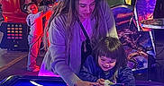 Francisco Zayden is registered to the contest to win money with this photo: air_hockey, arcade, arcade_machine, child, colorful, crowd, entertainment, family, fun, game, happy, hockey_puck, indoor, interaction, leisure, neon_lights, people, playing, smile, woman