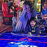 Francisco Zayden joined the competition — help win amazing prizes! arcade, air_hockey, child, woman, smile, game, neon_lights, indoor, people, entertainment, fun, colorful, machine, playing, crowd, casual_clothing, happy, leisure, family, activity