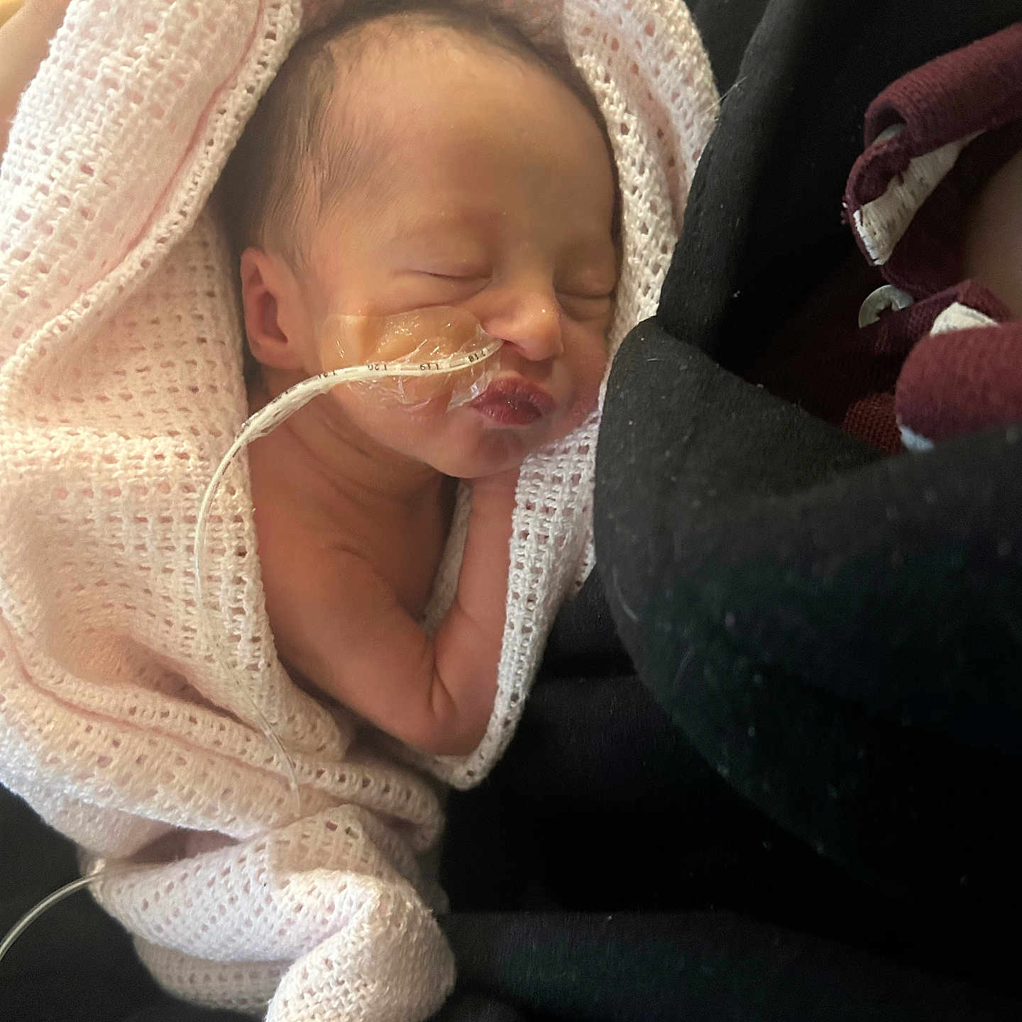 Gracie-May joined the competition — help win amazing prizes! architecture, baby, blanket, bonnet, building, clothing, cushion, face, glove, hat, head, hospital, knitwear, newborn, person, photography, portrait, sleeping, sweater, towel