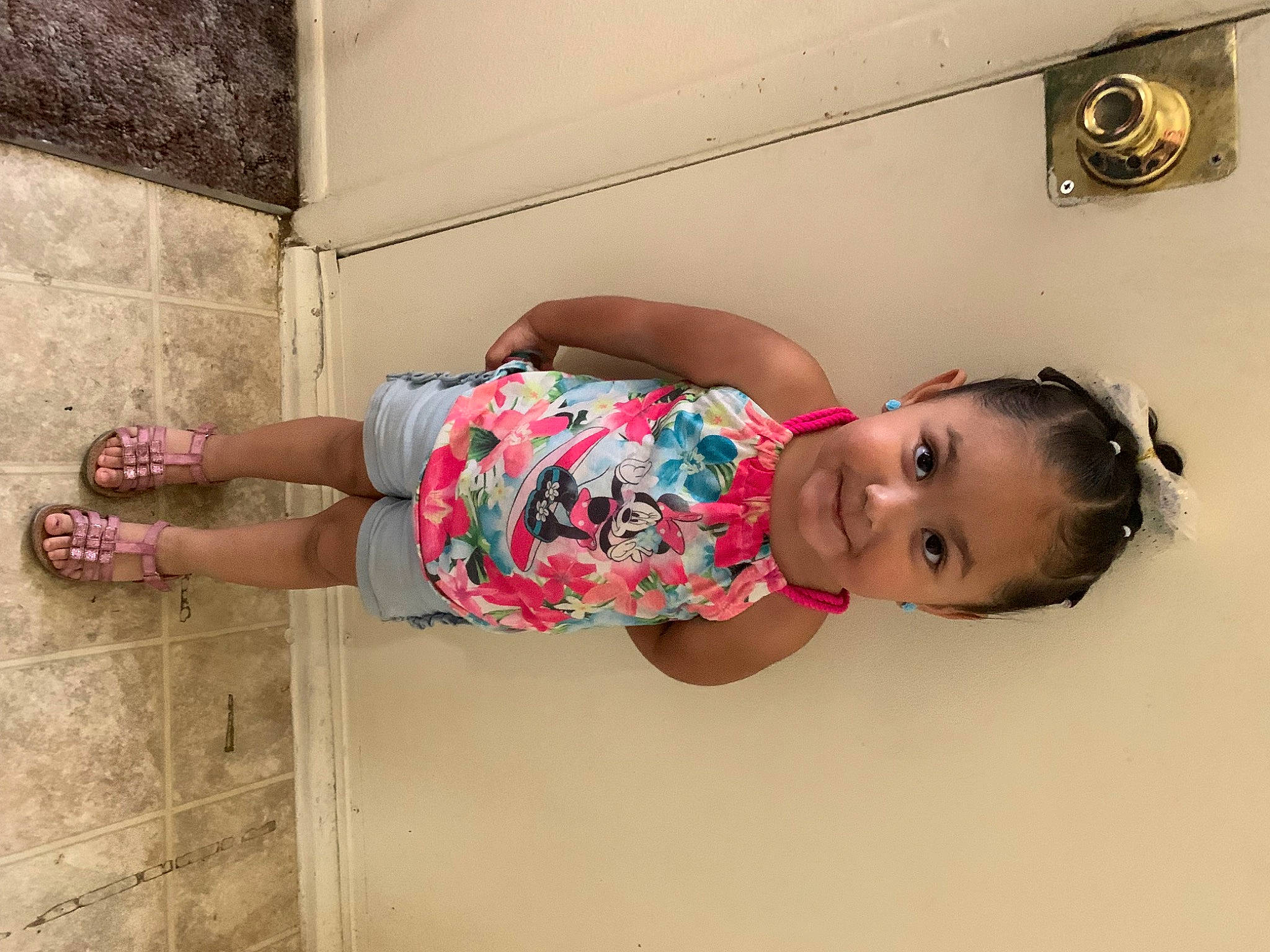 Ysabelle is registered to the contest to win money with this photo: abdomen, baby, baby_toddler_clothing, child, fun, happy, human_leg, joint, joy, magenta, pattern, person, pink, room, sandal, skin, sleeve, smile, thigh, toddler