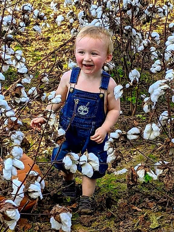 Caleb joined the competition — help win amazing prizes! baby_toddler_clothing, botany, child, electric_blue, fun, grass, grass_family, happy, human_leg, joy, leaf, pattern, people_in_nature, person, plant, sitting, smile, soil, spring, t_shirt