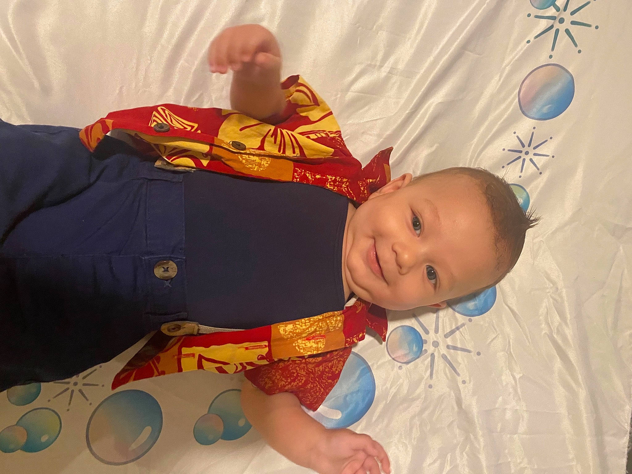 Luka is registered to the contest to win money with this photo: baby, baby_products, baby_toddler_clothing, carmine, child, comfort, elbow, event, fun, happy, holiday, joy, lap, linens, pattern, people, person, play, room, textile