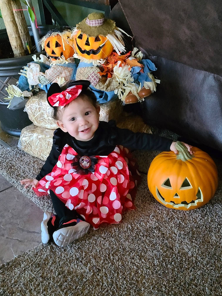 A'Naya is registered to the contest to win money with this photo: baby_toddler_clothing, calabaza, child, cucurbita, flooring, gourd, happy, hat, jack_o_lantern, joy, leaf, orange, person, plant, pumpkin, smile, squash, toddler, tree, vegetable