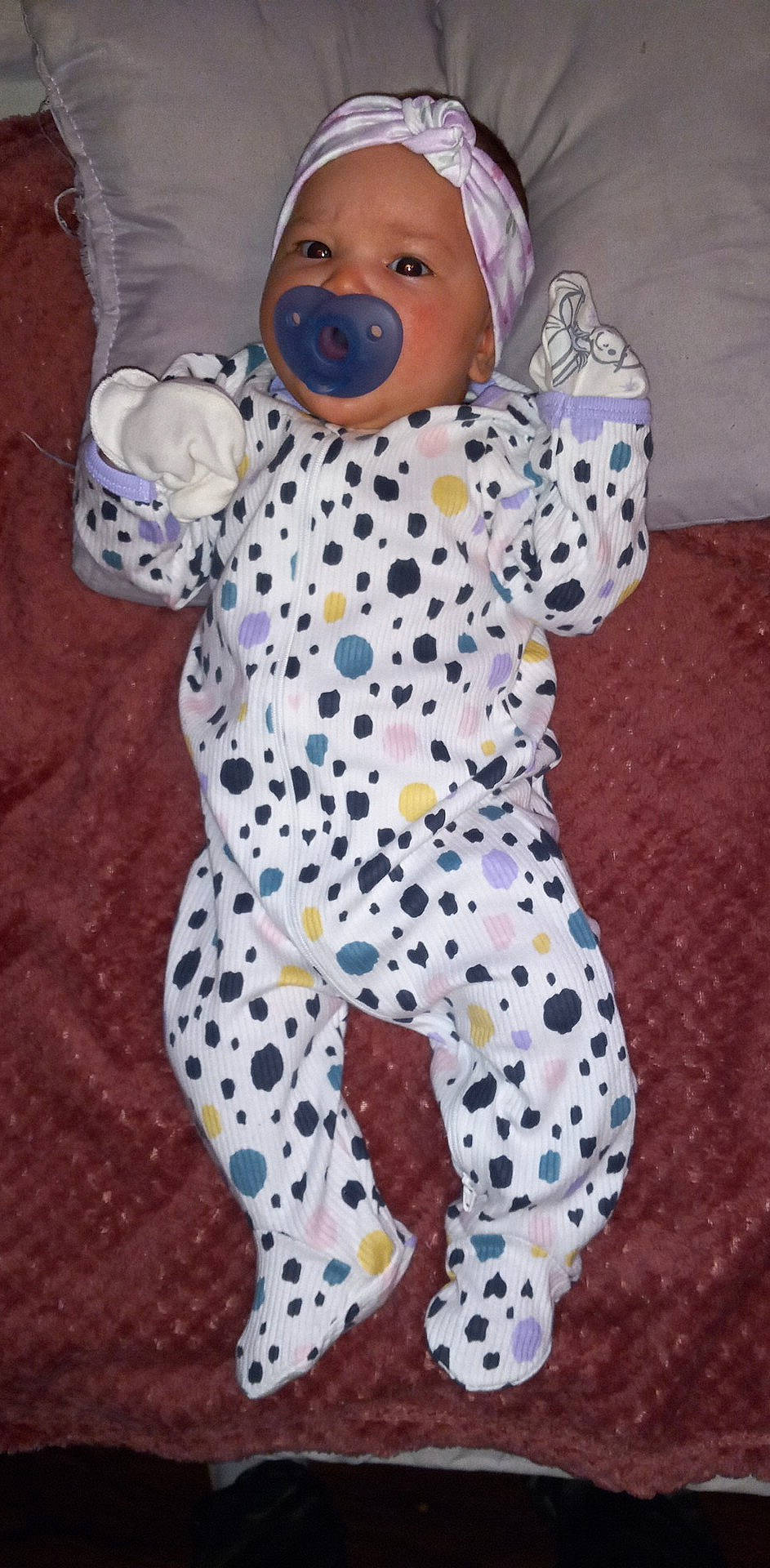 Amelia Jane is registered to the contest to win money with this photo: baby, baby_products, baby_toddler_clothing, carmine, child, costume, fur, hat, headwear, linens, pattern, person, personal_protective_equipment, plush, polka_dot, sleeve, stuffed_toy, t_shirt, toddler, toy