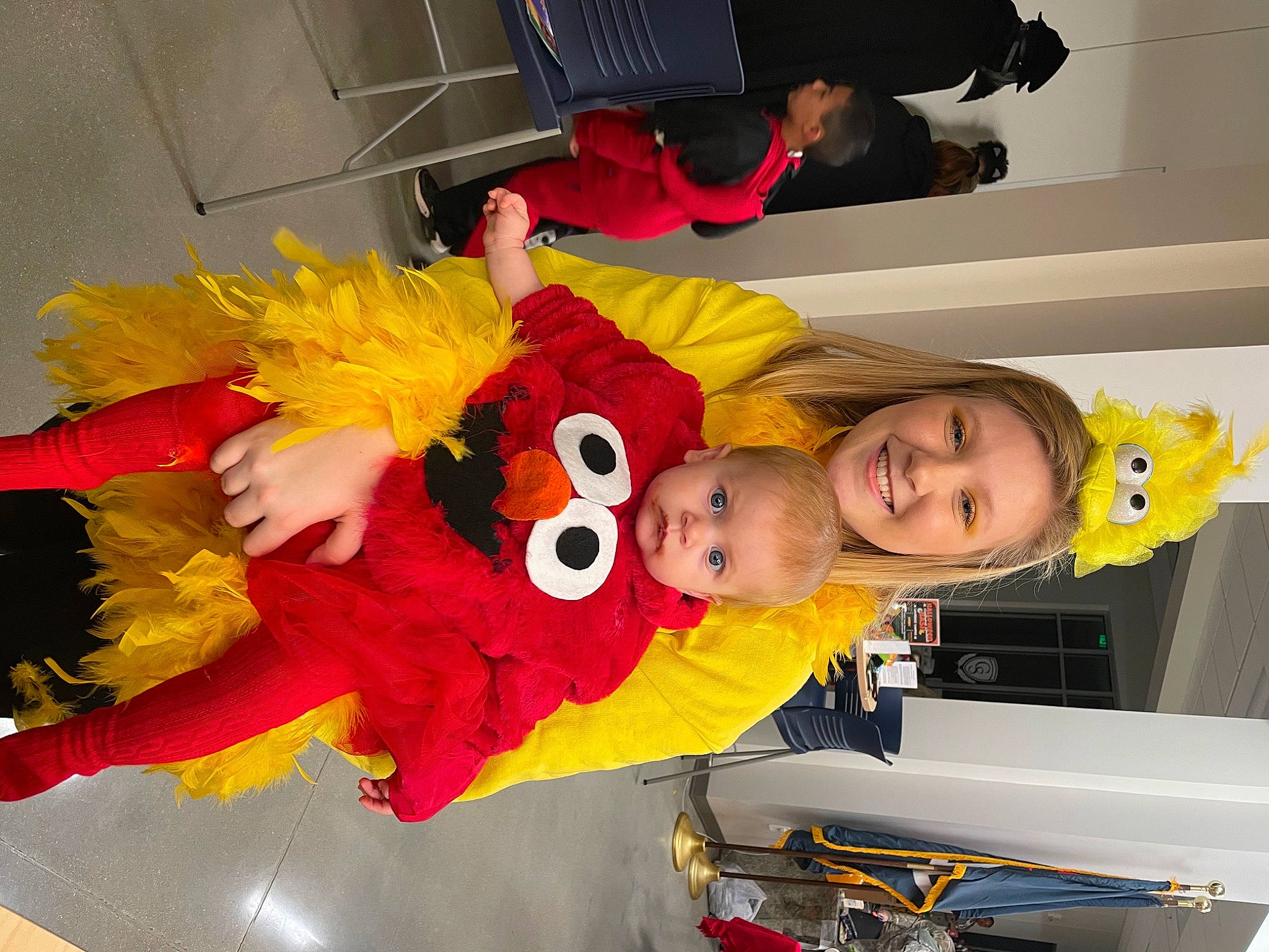 Bellamy joined the competition — help win amazing prizes! auto_part, automotive_exterior, baby_products, child, costume, event, family_car, fictional_character, fun, joy, luxury_vehicle, motor_vehicle, person, red, room, smile, toddler, trunk, vehicle_door, yellow