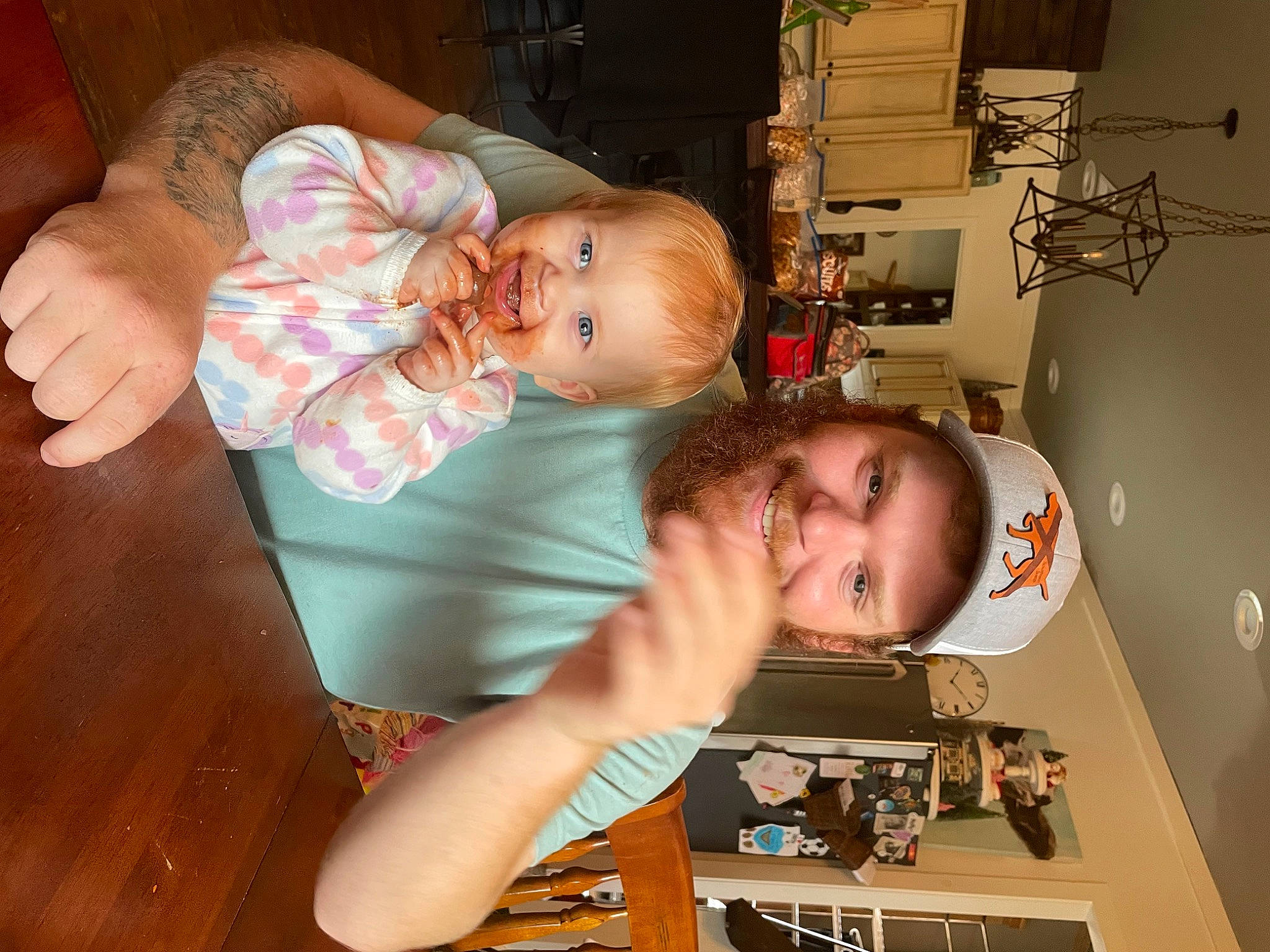 Bellamy is registered to the contest to win money with this photo: arm, baby, baby_products, baby_toddler_clothing, child, comfort, ear, finger, fun, hand, happy, headwear, joy, machine, mouth, office_equipment, organ, person, room, skin