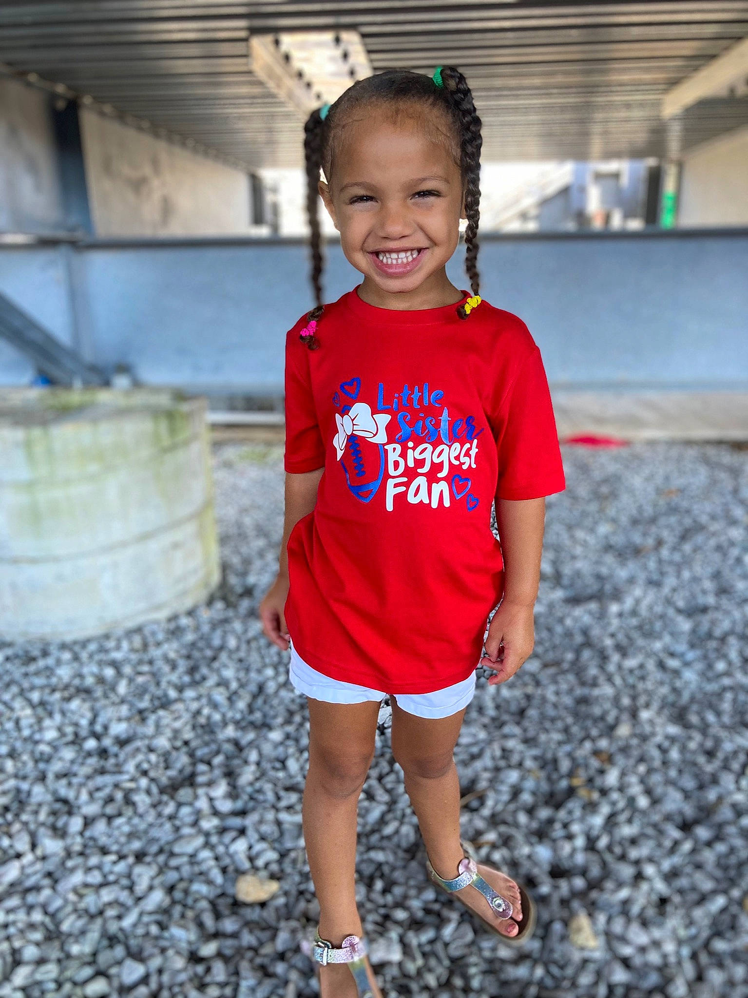 Kyler is registered to the contest to win money with this photo: asphalt, electric_blue, flash_photography, fun, hair, happy, human_leg, joy, leg, leisure, magenta, neck, person, recreation, shorts, shoulder, sleeve, smile, sportswear, t_shirt