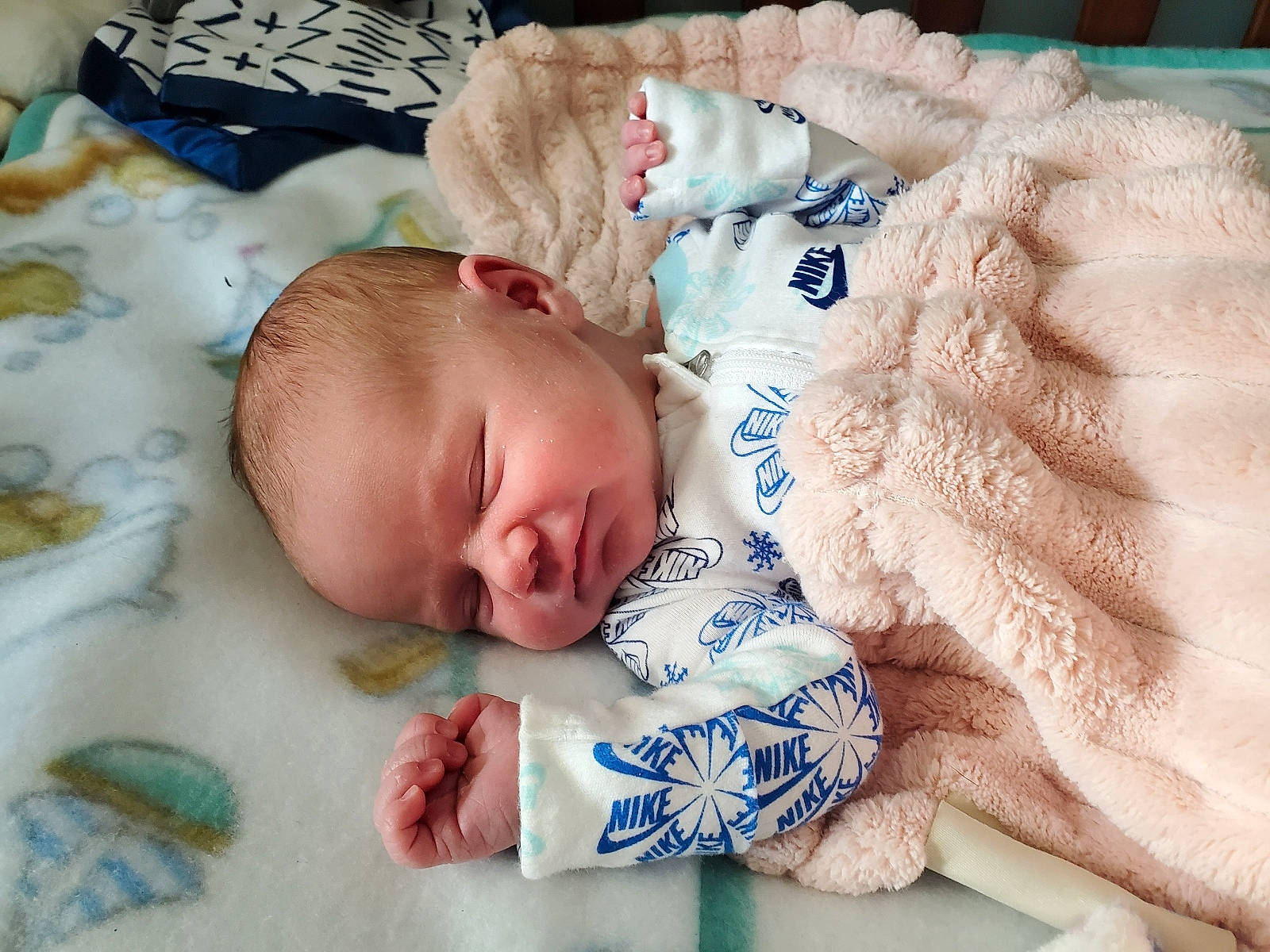 Raine is registered to the contest to win money with this photo: art, baby, baby_products, baby_sleeping, baby_toddler_clothing, bedtime, cheek, child, comfort, linens, nap, pattern, person, room, skin, sleep, textile, toddler