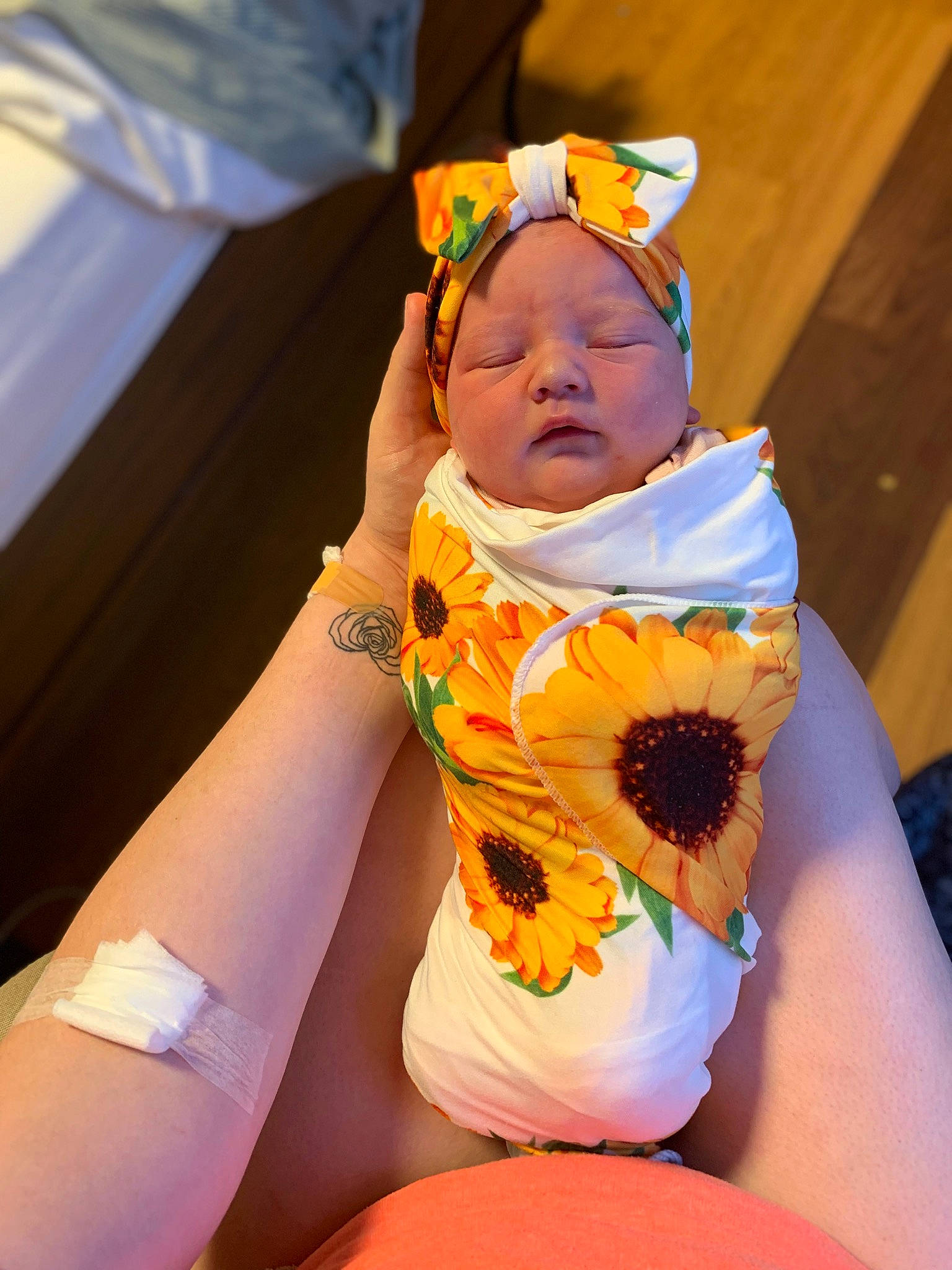 Delilah is registered to the contest to win money with this photo: abdomen, baby, child, comfort, elbow, event, finger, fun, happy, headwear, human_leg, knee, leisure, nail, person, service, sitting, thigh, thumb, toddler