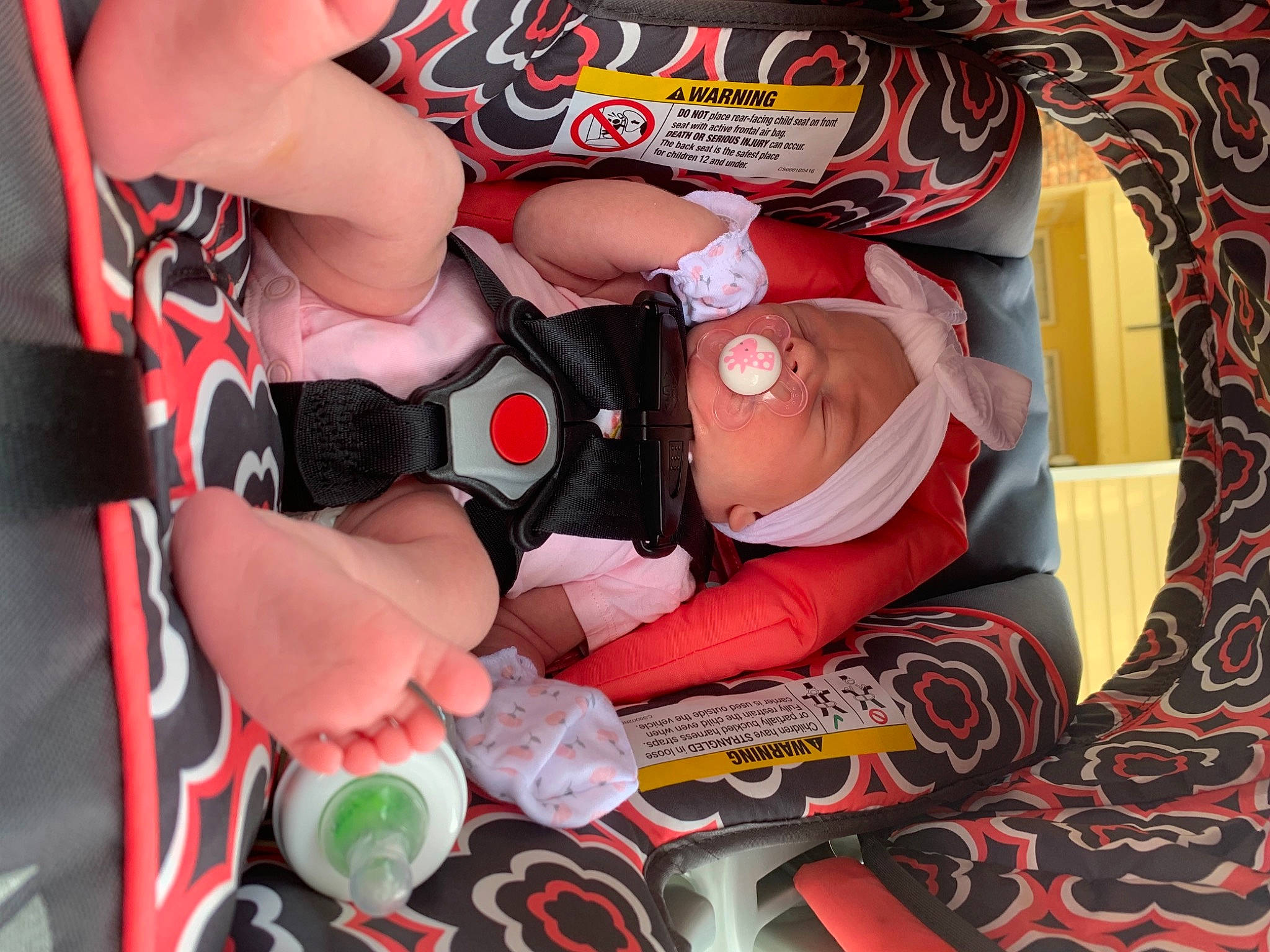 Delilah is registered to the contest to win money with this photo: baby, baby_products, carmine, chest, child, costume, eyewear, fashion_accessory, fictional_character, flesh, headgear, nail, orange, pattern, peach, person, personal_protective_equipment, pink, service, sunglasses