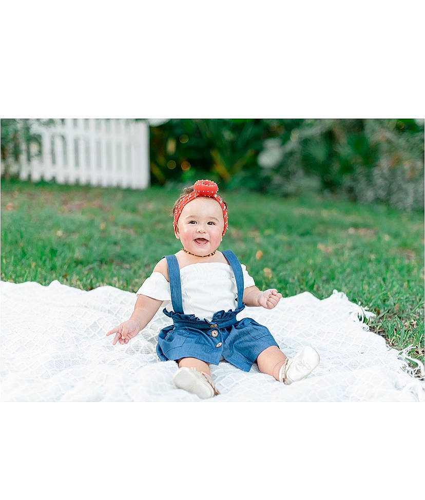 Gracee joined the competition — help win amazing prizes! baby, baby_toddler_clothing, beanie, bonnet, child_model, costume_accessory, denim, embellishment, headband, headgear, headwear, people_in_nature, person, photo_shoot, playing_with_kids, portrait_photography, sitting, toddler, winter